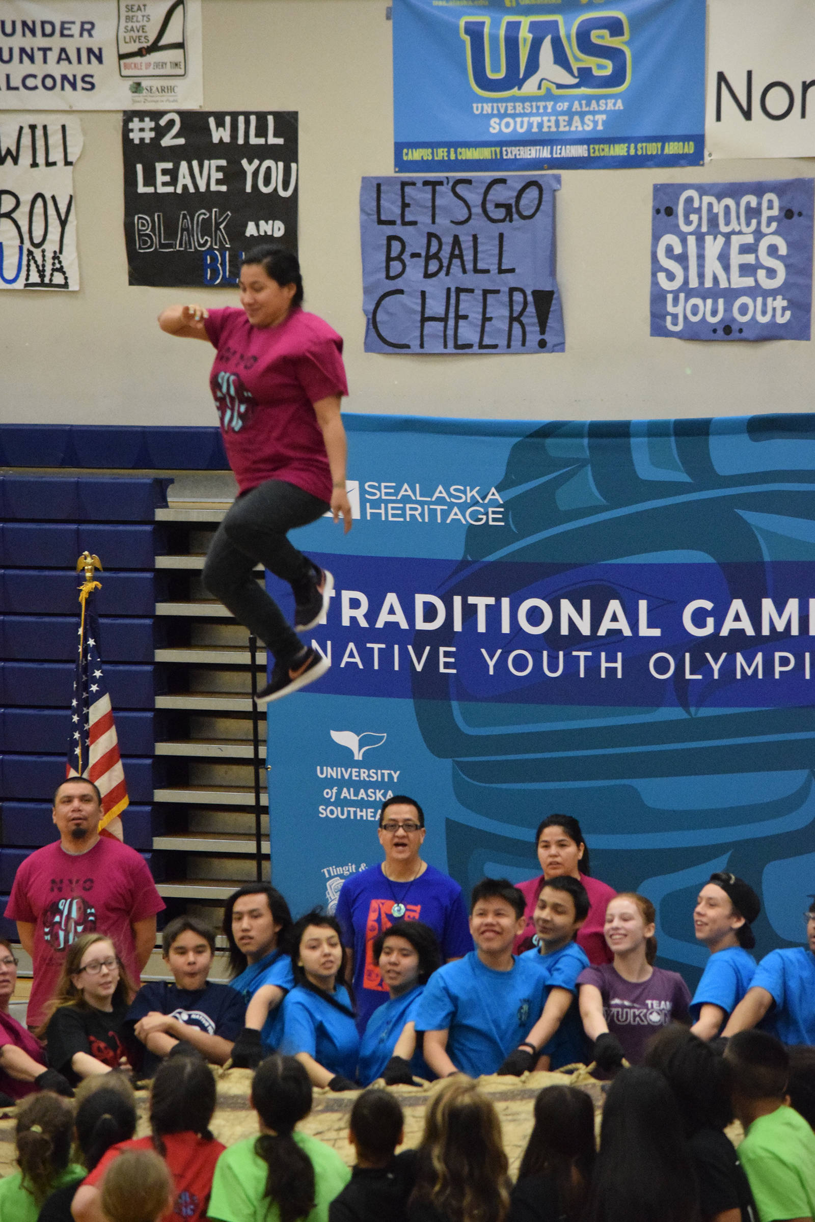 Traditional Games official and former World Eskimo-Indian Olympics blanket toss winner Marjorie Tahbone shows off her skills to kick off the 2019 Traditional Games at Thunder Mountain High School on March 16, 2019. (Nolin Ainsworth | Juneau Empire)