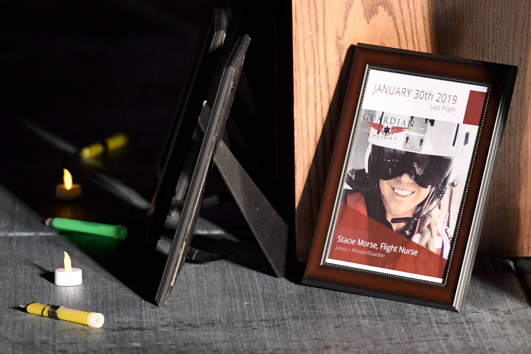 Hundreds of Juneau residents turnout Friday, Feb. 1, 2019, in 8-degree weather for a candlelight vigil at Mayor Bill Overstreet Park for the Guardian medical flight crew that lost their lives in a plane crash this week. (Michael Penn | Juneau Empire File)