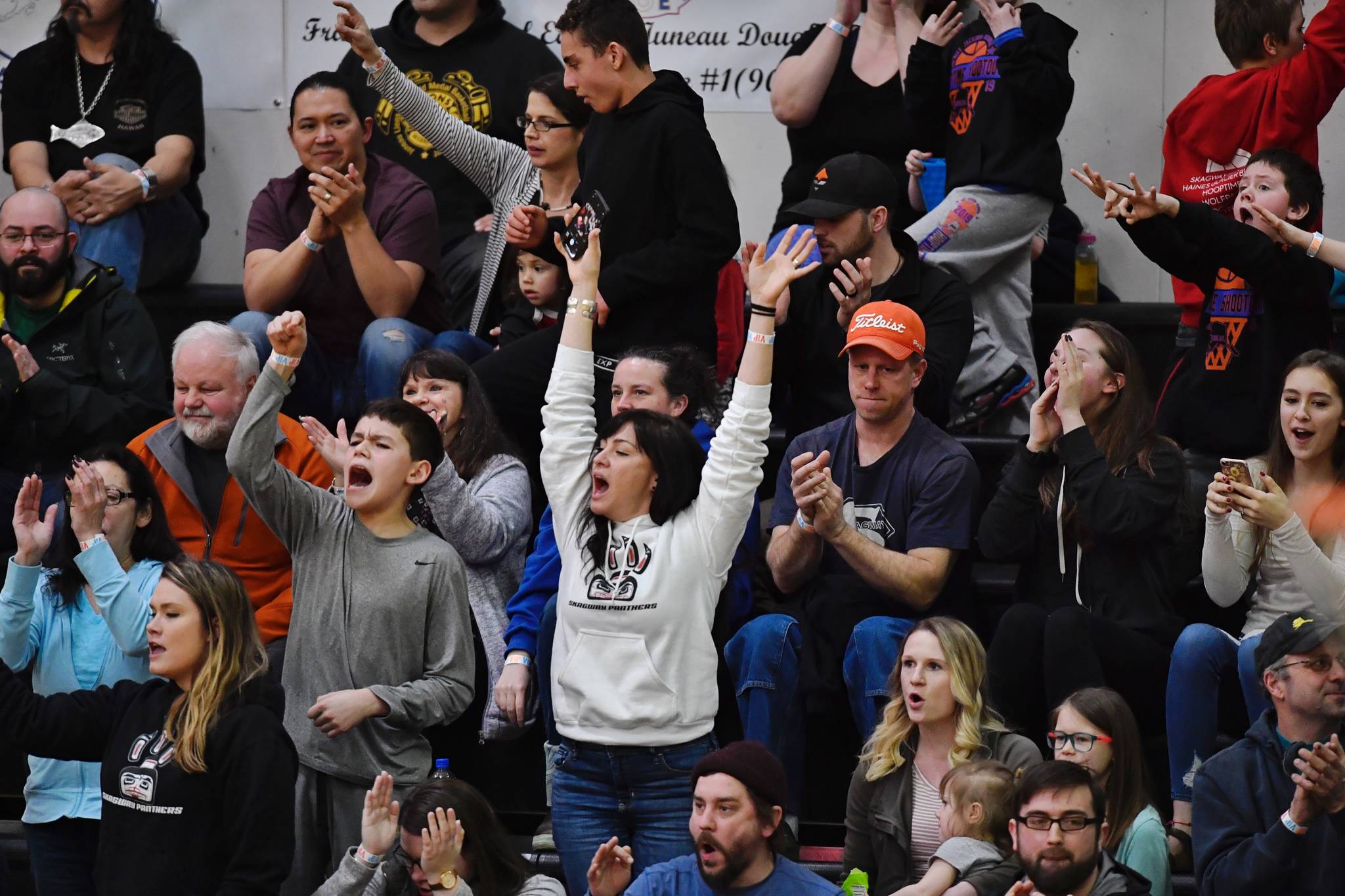 Skagway fans cheer on their women’s team against Haines in the women’s final at the Gold Medal Basketball Tournament on Saturday, March 23, 2019. (Michael Penn | Juneau Empire)