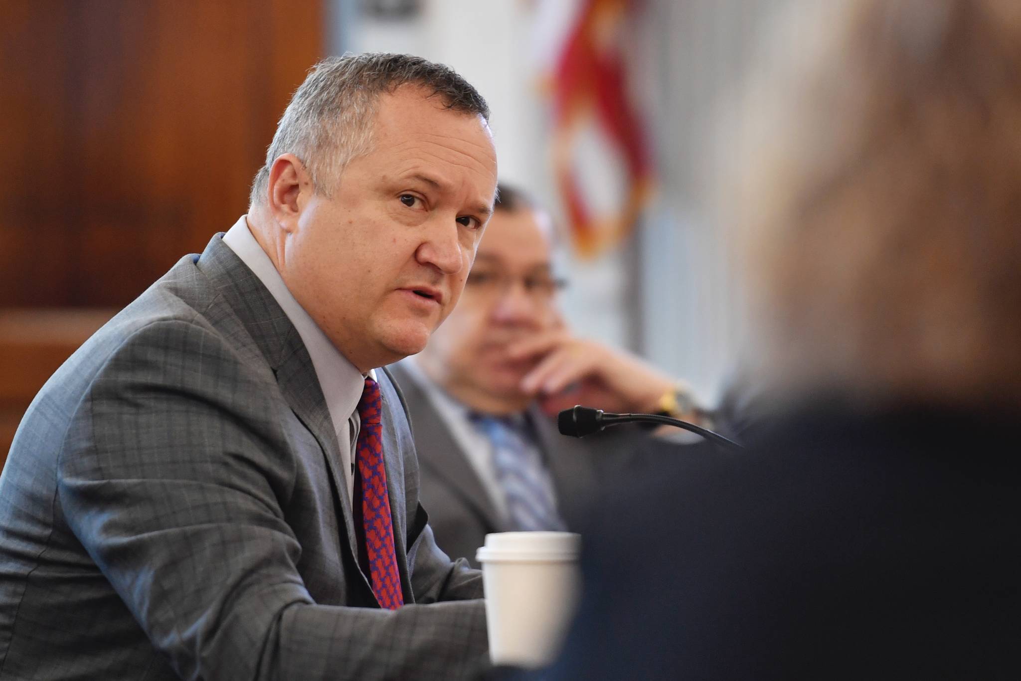 Sen. Mike Shower, R-Wasilla, questions Dr. Suzanne Allen, from Boise, Idaho, who was giving an overview of the WWAMI School of Medical Education program to the Senate Finance Committee at the Capitol on Monday, March 25, 2019. (Michael Penn | Juneau Empire)