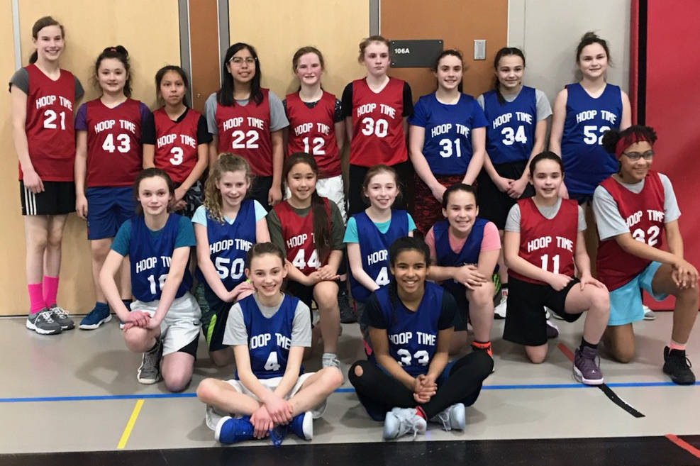 The HoopTime Blue and Red teams pose together they squared off in the Girls C/D Division championship of the HoopTime Mike Jackson Memorial Shootout at Floyd Dryden Middle School. The Blue team won 25-24. (Courtesy Photo | Sue Beckerman)