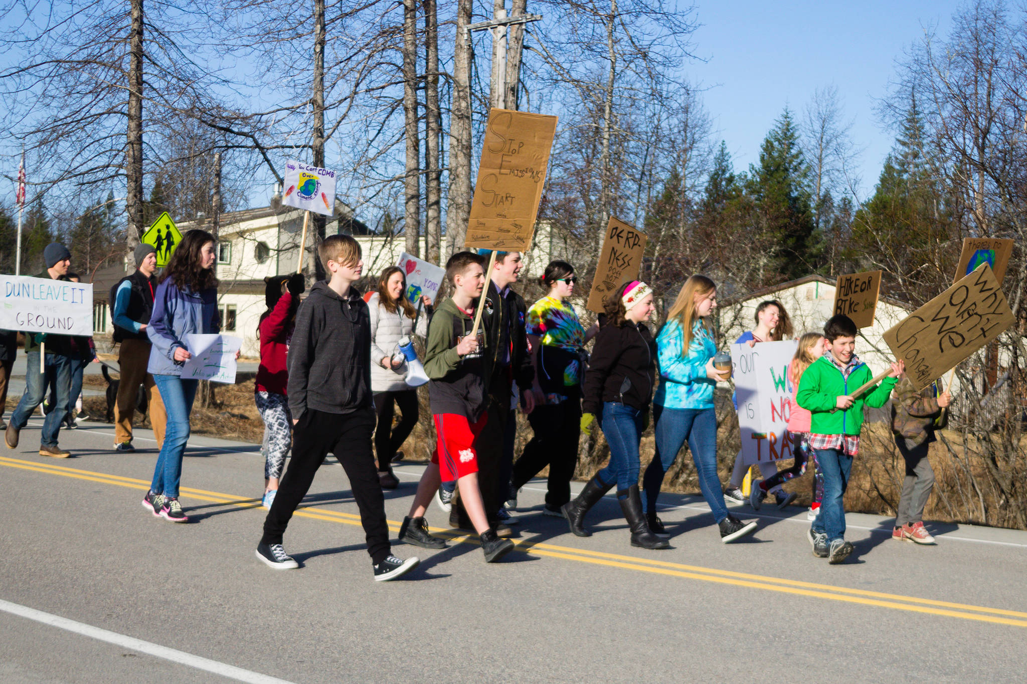 Gustavus students demand action on climate change by marching out of school on Friday. (Courtesy photo | Iris White)