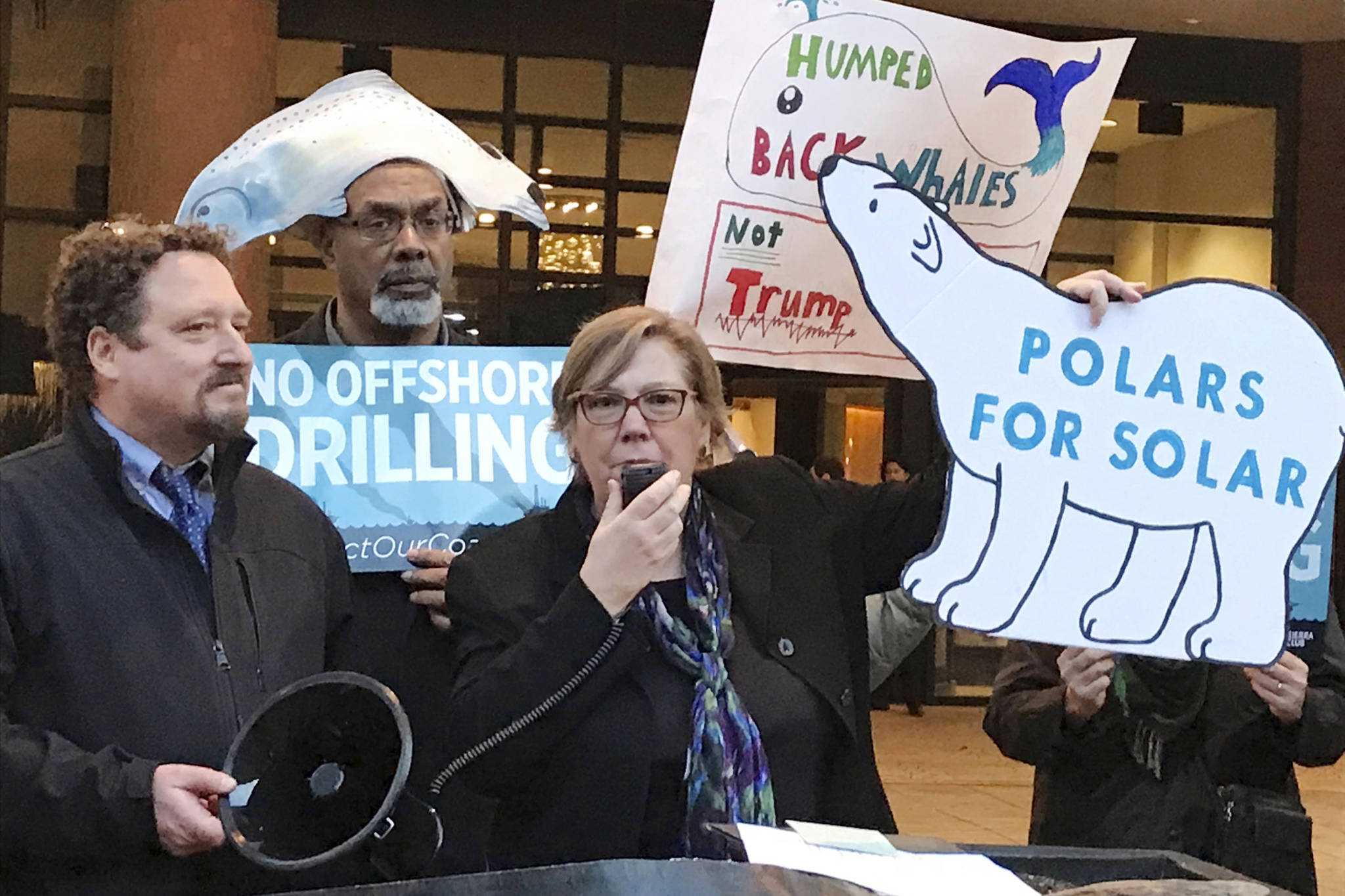 In this Feb. 15, 2018 photo, Judith Enck, center, former regional administrator for the Environmental Protection Agency addresses those gathered at a protest against President Trump’s plan to expand offshore drilling for oil and gas in Albany, New York. A U.S. judge in Alaska says President Donald Trump exceeded his authority when he reversed a ban on offshore drilling in vast parts of the Arctic Ocean and dozens of canyons in the Atlantic Ocean. (David Klepper | Associated Press File)