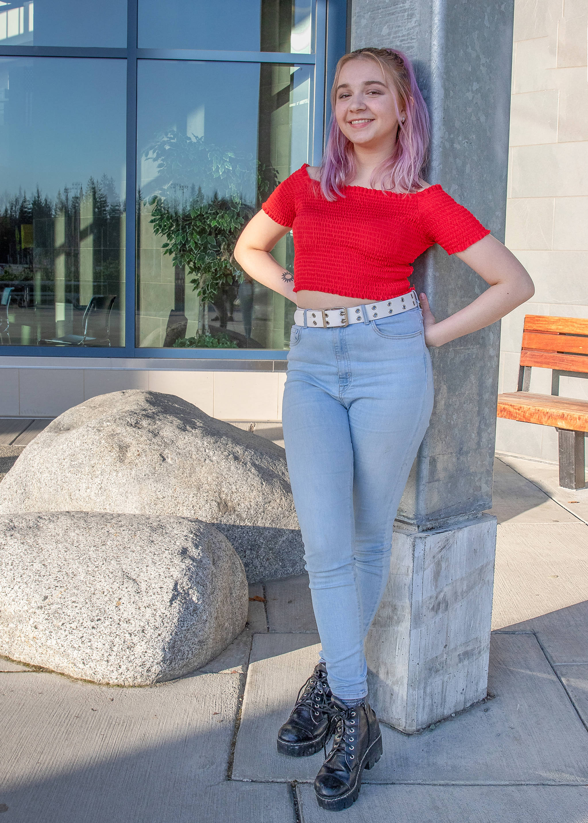 April 28, 2019: Caro Schultheis, a Juneau-Gastineau Rotary Club exchange student, hails from Buenos Aires, Argentina. She brings a trendy and fashionable style to Juneau with her. This day she wore a red off-the-shoulder crop top from Ona Saez, high-rise skinny jeans from Forever 21, a white faux leather belt and bold, black leather lace-up boots. Her finishing touch — streaks in her hair courtesy of Arctic Fox, purple rain.
