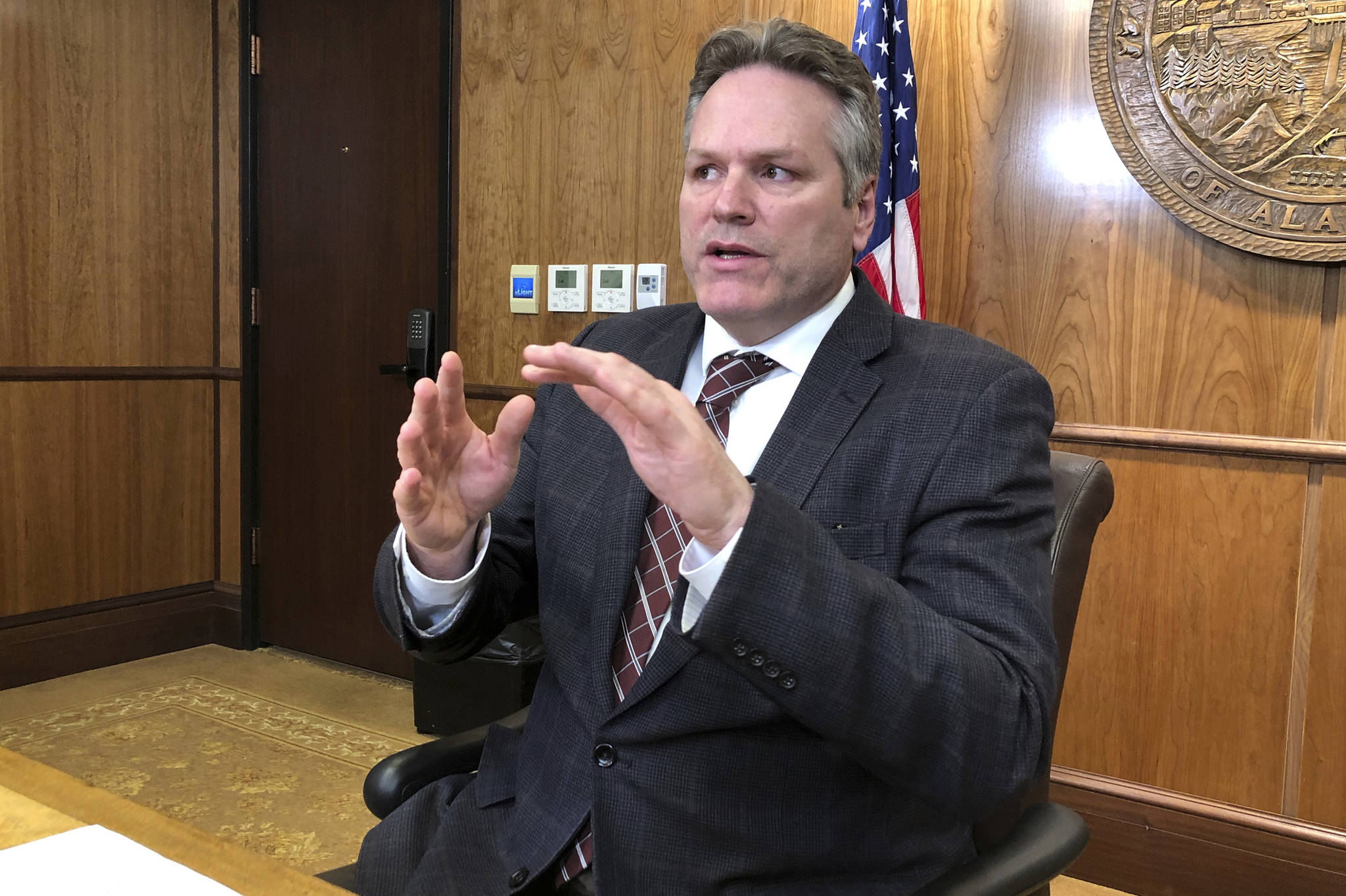 In this March 8 photo, Gov. Mike Dunleavy talks to reporters during a news conference in Juneau, Alaska. (Becky Bohrer | Associated Press File)