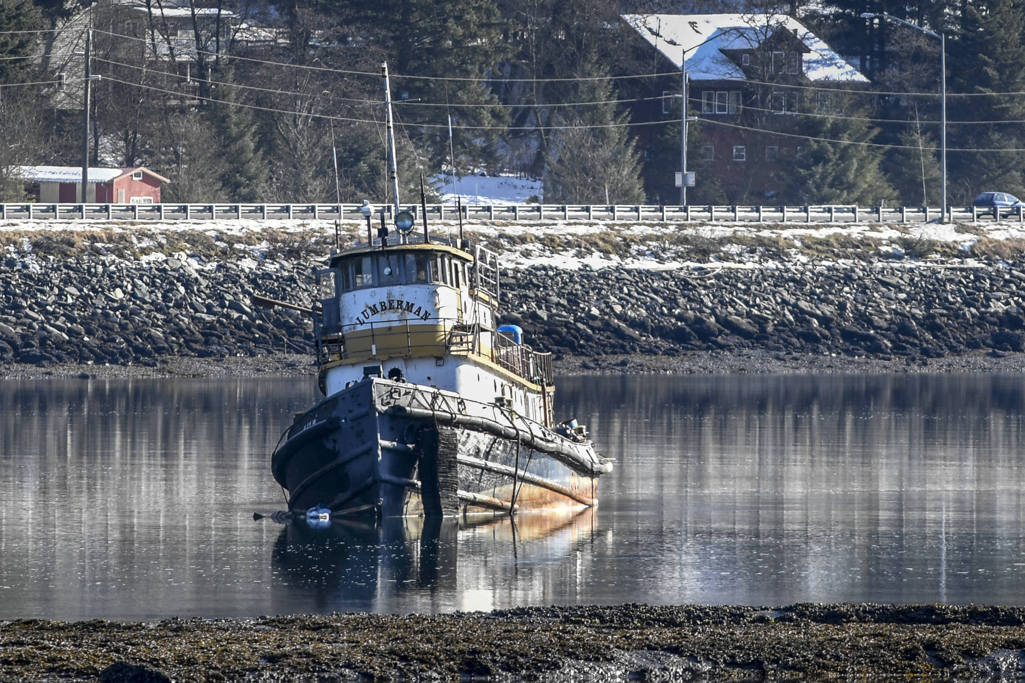 In this Feb. 26, 2019 photo, the derelict tug, the Lumberman, sits at anchor in Gastineau Channel. (Michael Penn | Juneau Empire File)