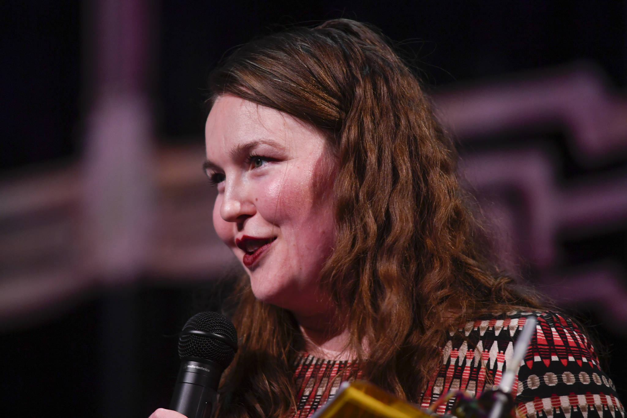 Johanna Evans emcees the first night of the 45th annual Alaska Folk Festival at Centennial Hall on Monday, April 8, 2019. (Michael Penn | Juneau Empire)