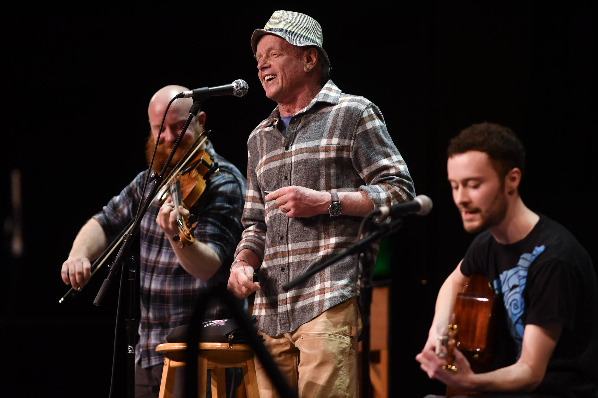 Tim Triggs, Zane Jones and Nate Wiley of the Wiley’s Coyotes, of Boulder, Colorado, perform at the 45th annual Alaska Folk Festival at Centennial Hall on Monday, April 8, 2019. (Michael Penn | Juneau Empire)