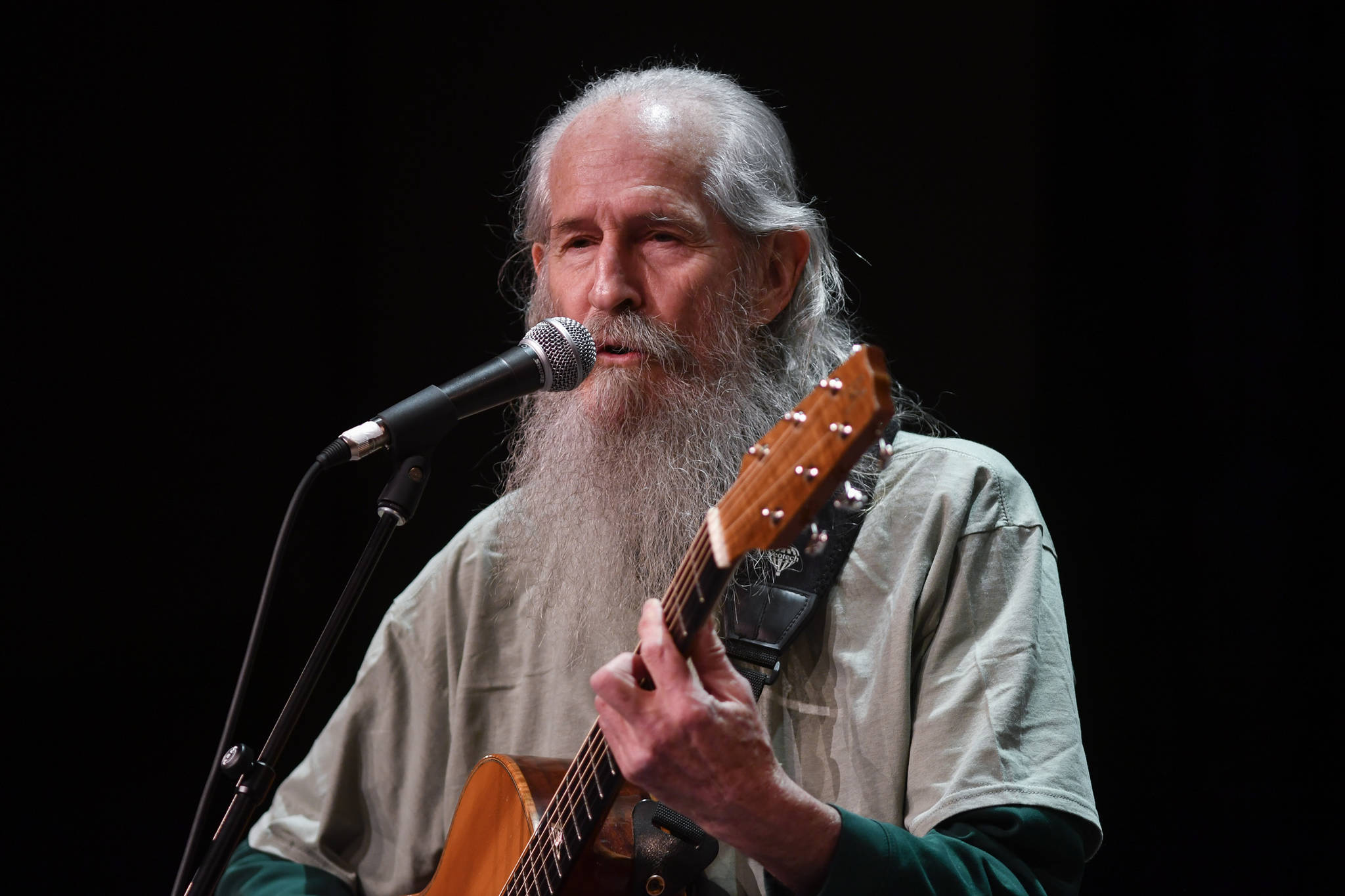 Hank Alrich, of Greenville, California, performs at the 45th annual Alaska Folk Festival at Centennial Hall on Monday, April 8, 2019. (Michael Penn | Juneau Empire)