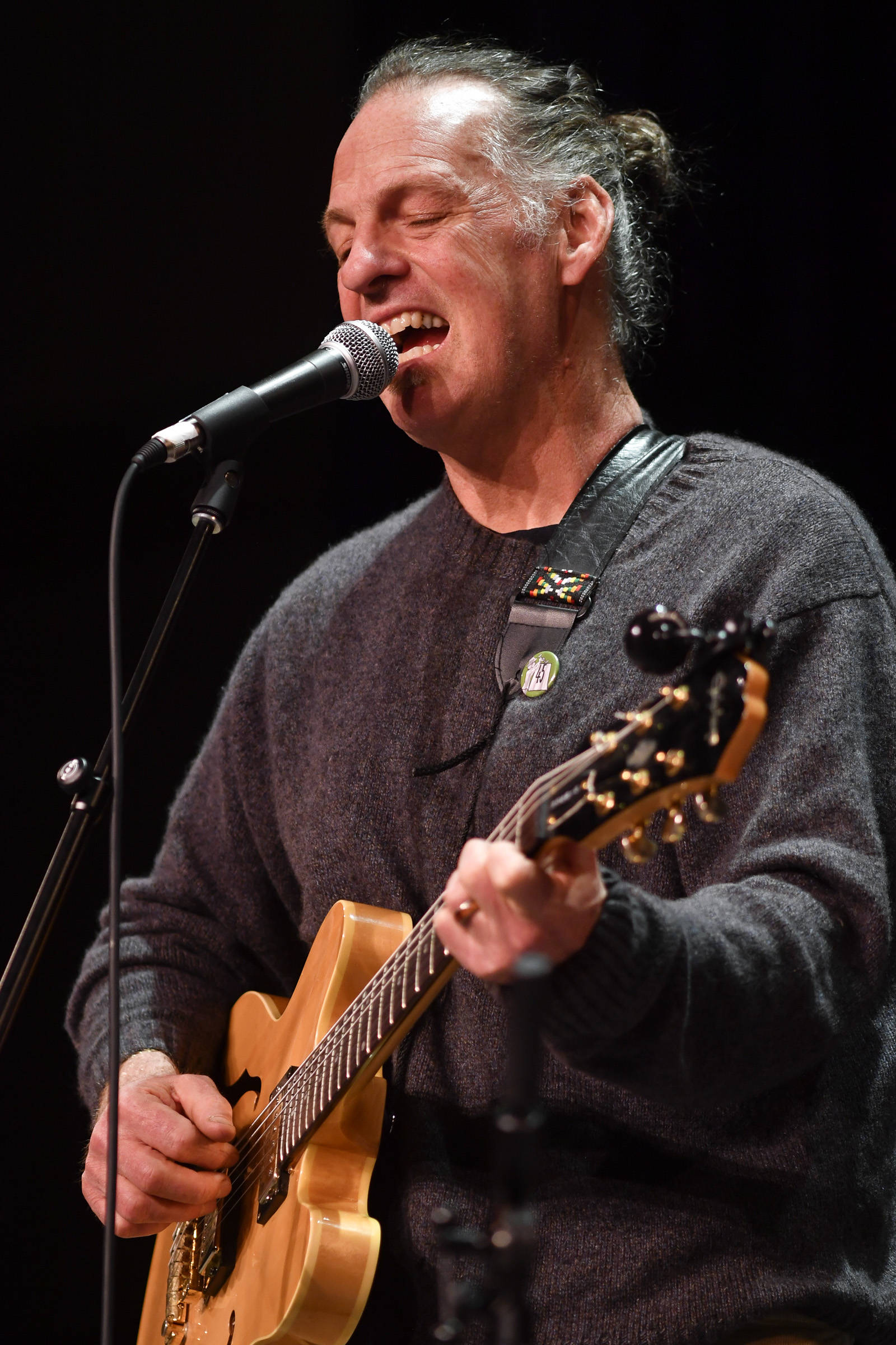 Carl Reese, of Juneau, performs at the 45th annual Alaska Folk Festival at Centennial Hall on Monday, April 8, 2019. (Michael Penn | Juneau Empire)