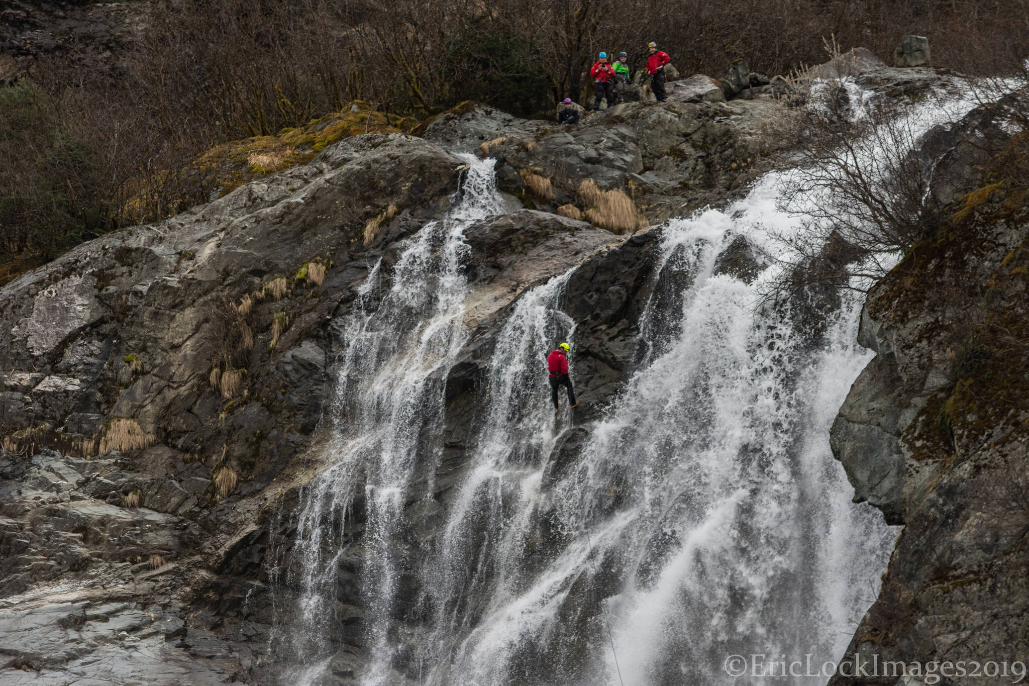 A daring group of friends rappel off Nugget Falls in Juneau on April 6, 2019. (Courtesy Photo | Eric Lock)