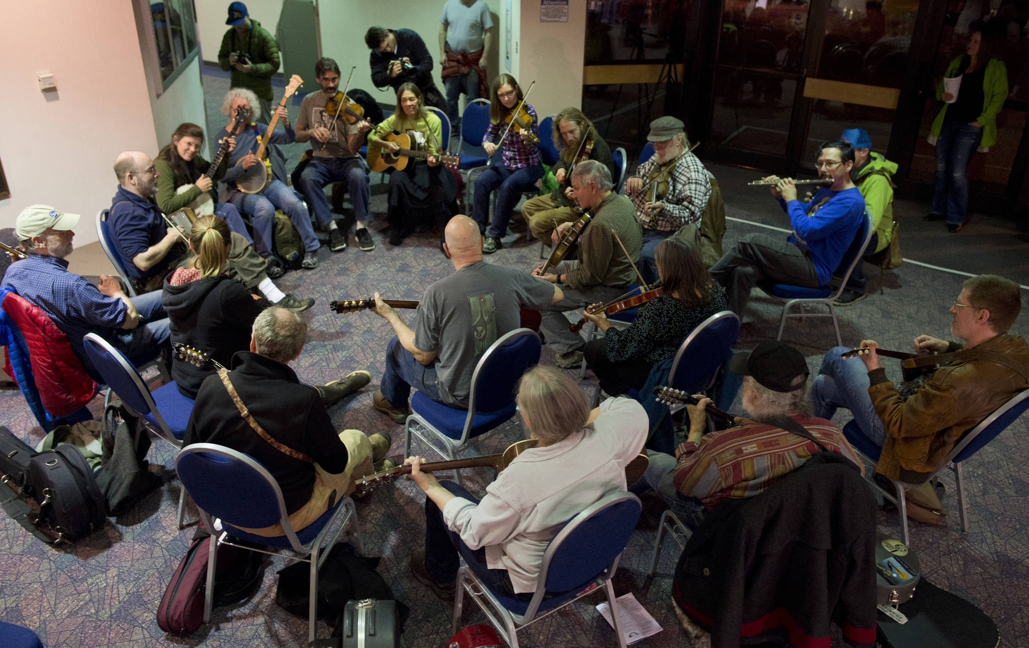 In this April 4, 2017 photo, a jam session with 20 musicians fills the hall with music at the 43rd annual Alaska Folk Festival at Centennial Hall. (Michael Penn | Juneau Empire)
