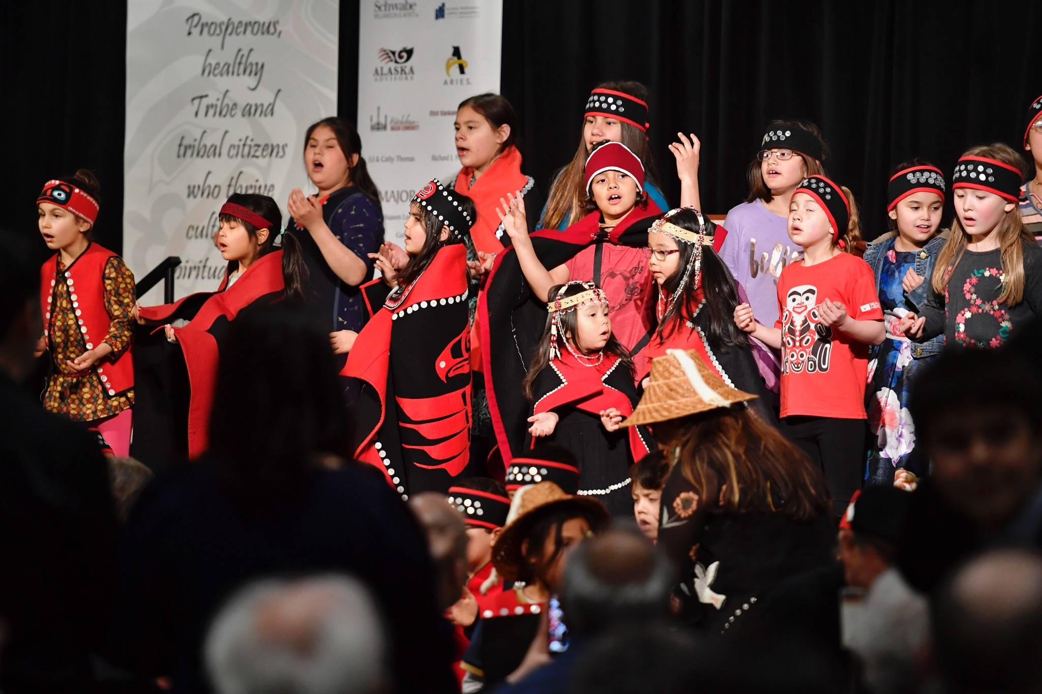 Students with the Tlingit Culture, Language and Literacy program at Harborview Elementary School perform during the President’s Award Banquet and Language Fundraiser at the Elizabeth Peratrovich Hall on Friday, April 12, 2019. (Michael Penn | Juneau Empire)