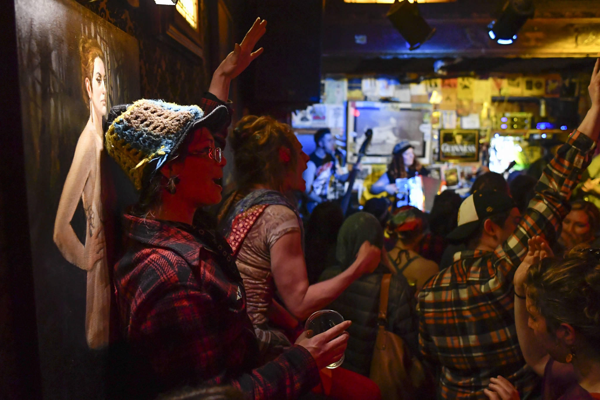 Bar patrons and music lovers catch The Shoot Dangs at the Alaskan Hotel & Bar during Alaska Folk Festival week on Friday, April 12, 2019. (Michael Penn | Juneau Empire)