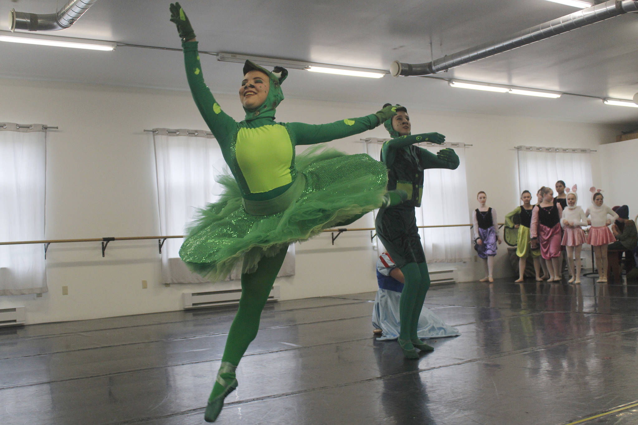 Dancer Elin Antaya, portraying a frog, dances during a rehearsal for Juneau Dance Theatre’s production of “Snow White” at Juneau Dance Theatre on Saturday, April 20, 2019. (Alex McCarthy | Juneau Empire)