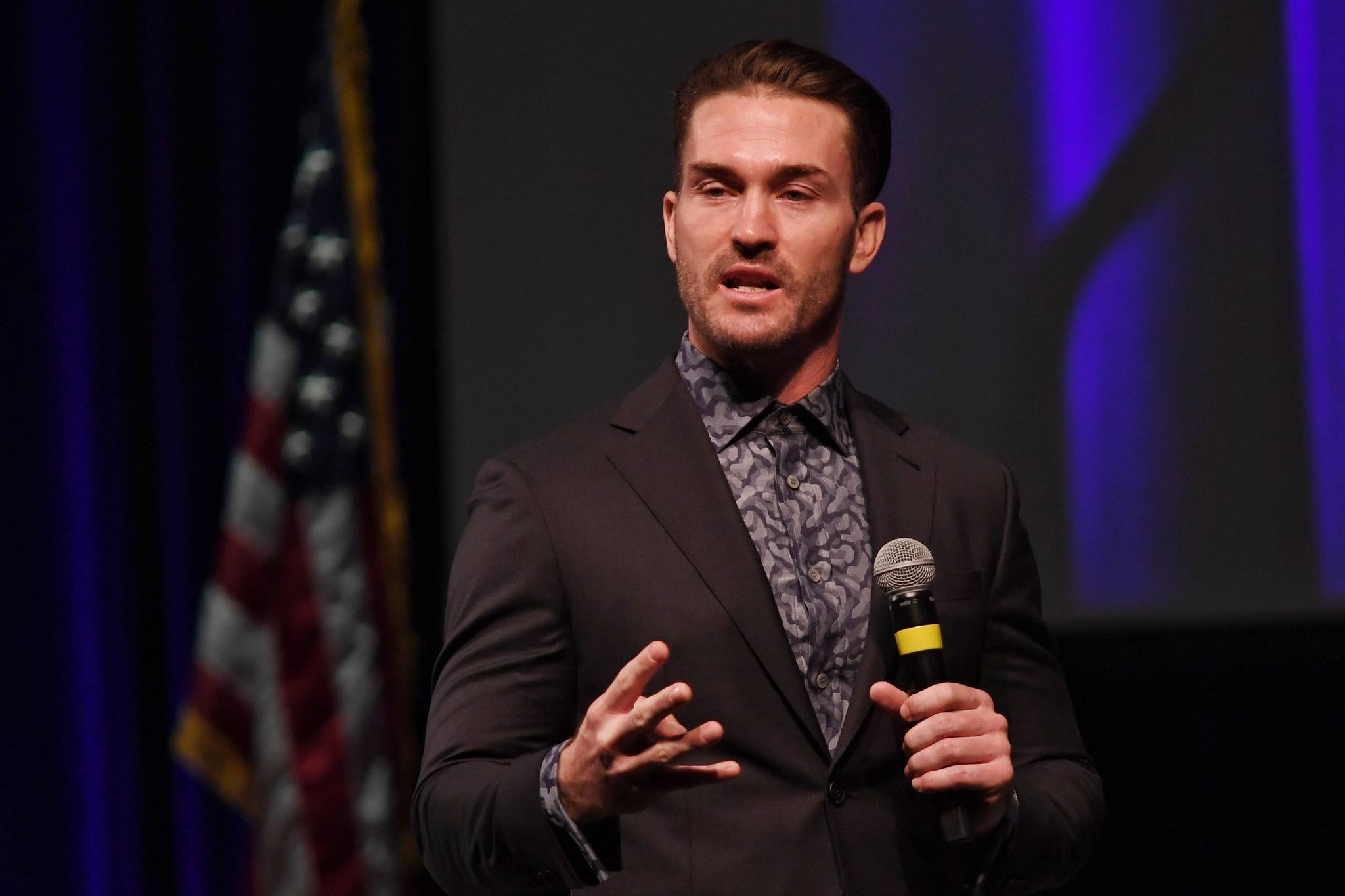 Tony Hoffman, former BMX Elite Pro racer and recovering drug addict, speaks at the Pillars of America event at Centennial Hall on Wednesday, April 24, 2019.The event is the second of three in the series sponsored by the Juneau Glacier Valley Rotary Club. (Michael Penn | Juneau Empire)