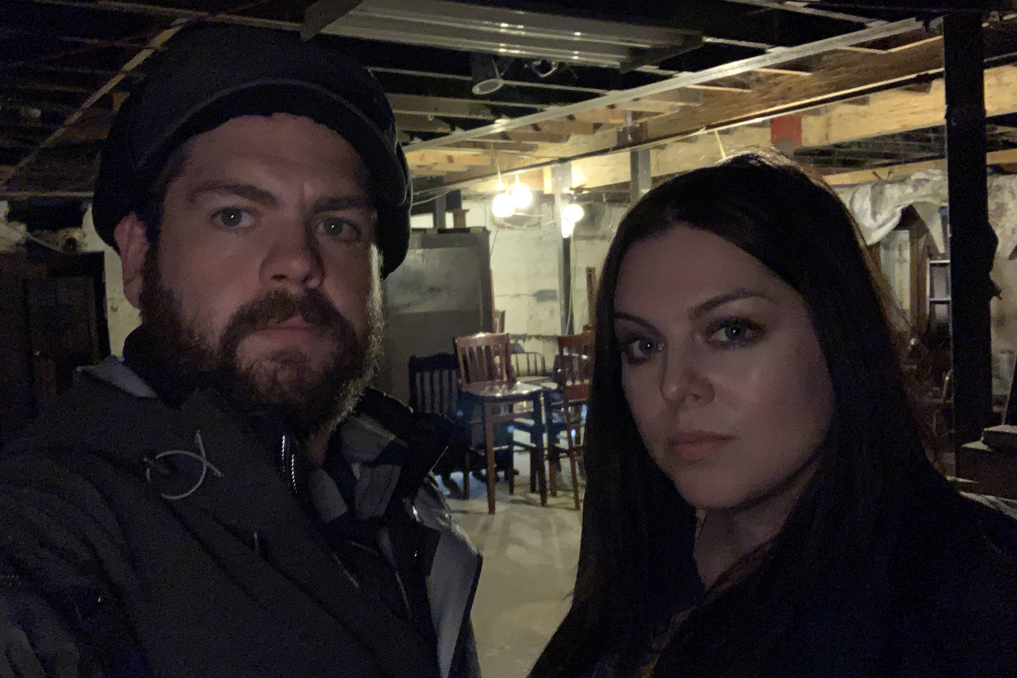 Jack Osbourne and Katrina Weidman prepare to investigate the basement of the Alaskan Hotel, which will be shown in an episode of the TV show “Portals to Hell.” (Courtesy Photo | Travel Channel)