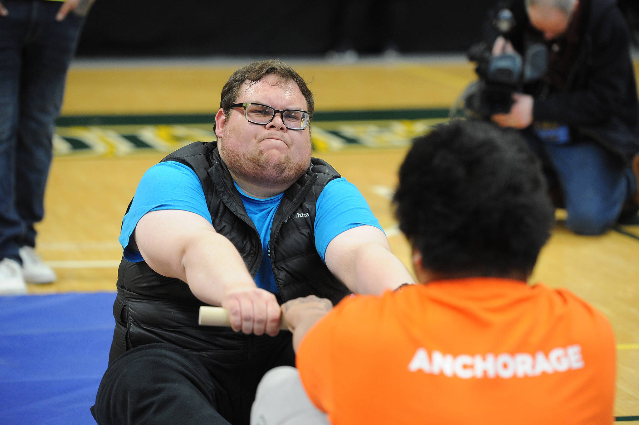 Thunder Mountain High School senior Sterling Zuboff competes in the Eskimo Stick Pull at the 2019 NYO Games at the Alaska Airlines Center in Anchorage on Friday, April 26, 2019. (Michael Dinneen | For the Empire)