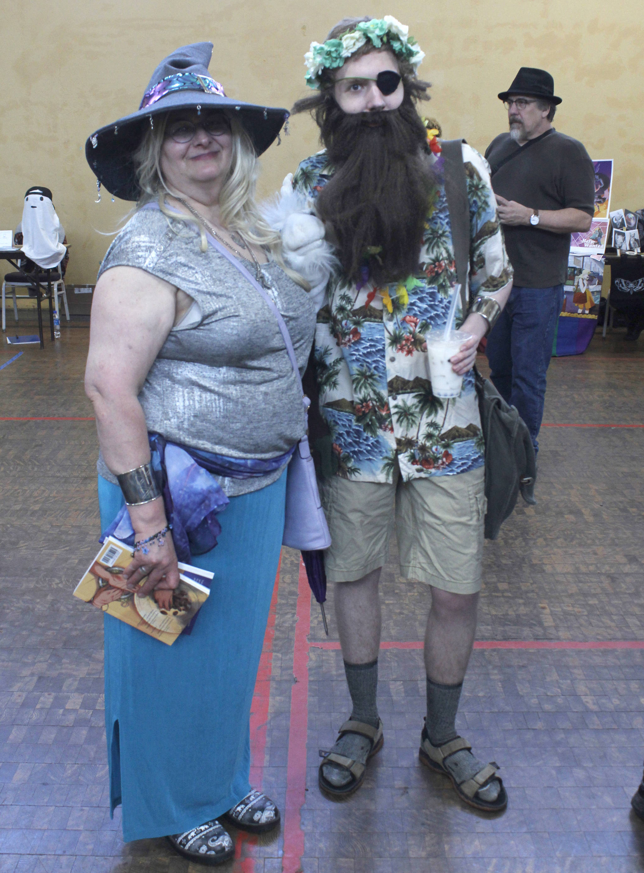Rachel and Honesty Zahnd, as Taako and Merle from the Adventure Zone podcast, respectively, are pictured at the Alaska Robotics Mini-Con on Saturday, April 27, 2019. (Alex McCarthy | Juneau Empire)