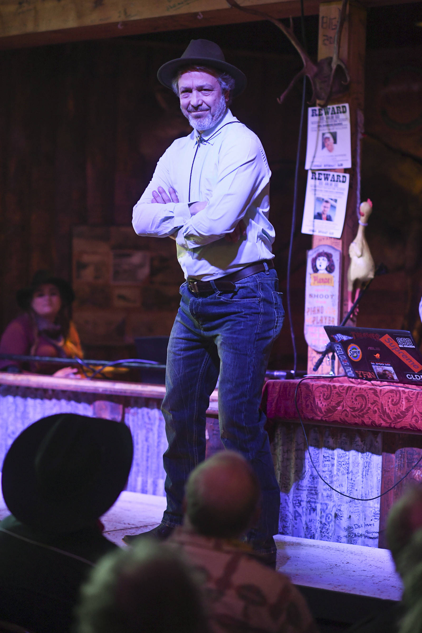 Men’s clothing from 4th Coast Outfitters is modeled on stage during the Juneau Rotaract’s Wild West Roundup Fashion Show at the Red Dog Saloon on Saturday, April 27, 2019. (Michael Penn | Juneau Empire)