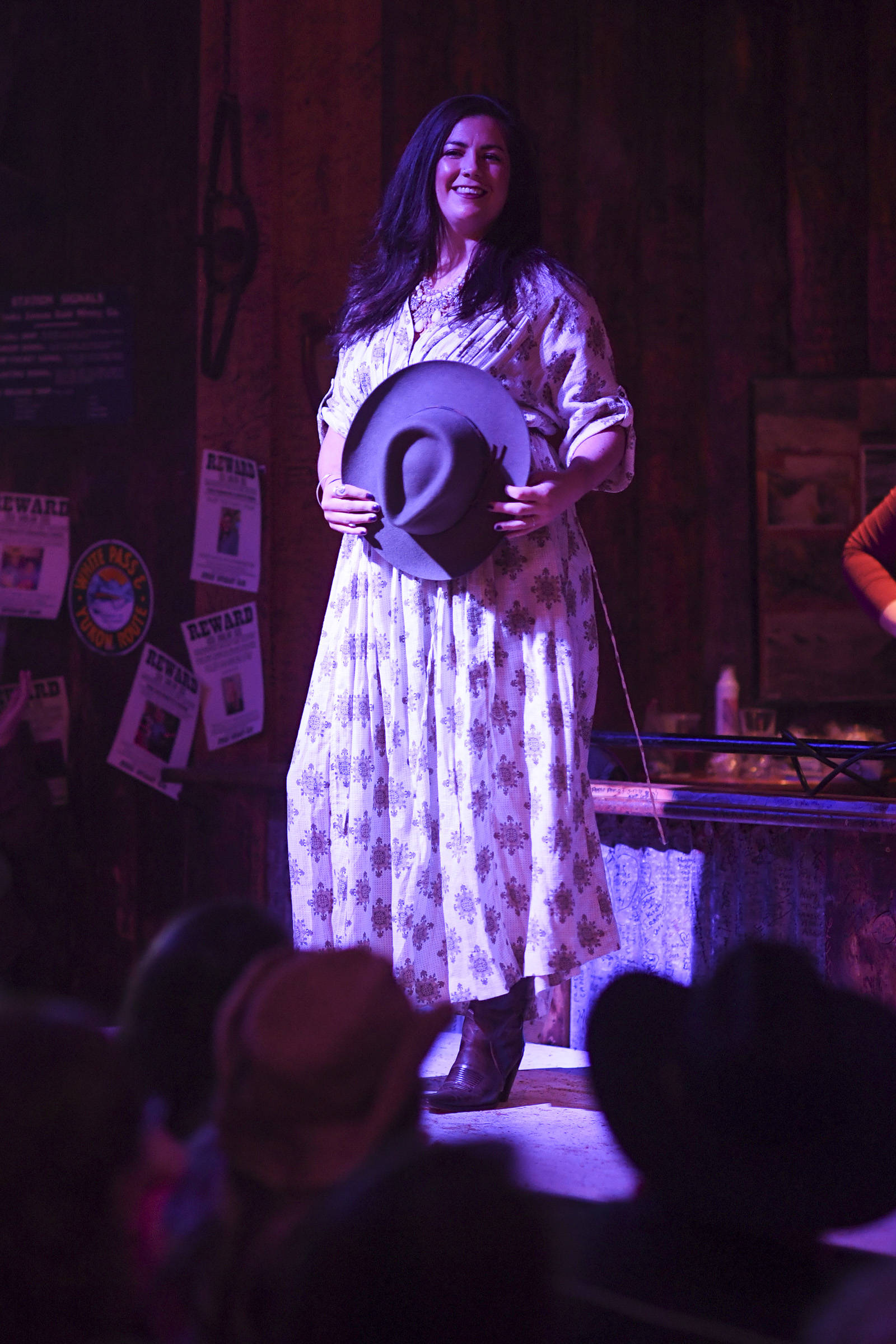 Men’s and women’s clothing from Downtown Dames Resale Shop is modeled on stage during the Juneau Rotaract’s Wild West Roundup Fashion Show at the Red Dog Saloon on Saturday, April 27, 2019. (Michael Penn | Juneau Empire)
