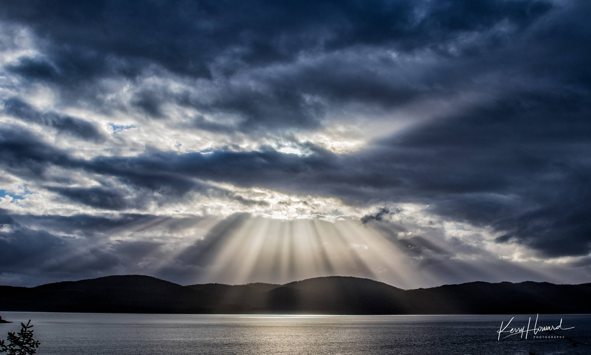 Sun rays at sunset over Shelter Island in Juneau on April 12, 2019. (Courtesy Photo | Kerry Howard)