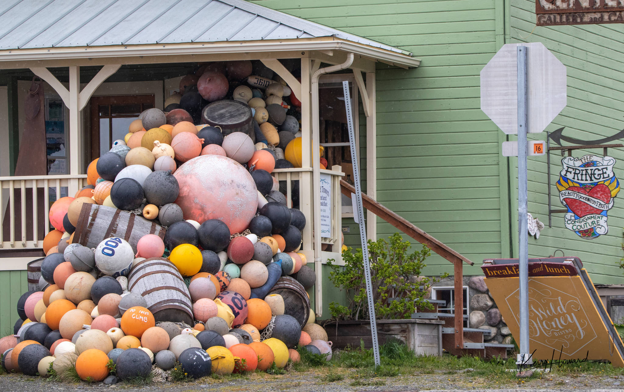 Dozens of buoys decorate the front porch of this building in Homer on May 10, 2019. (Courtesy Photo | Kerry Howard)