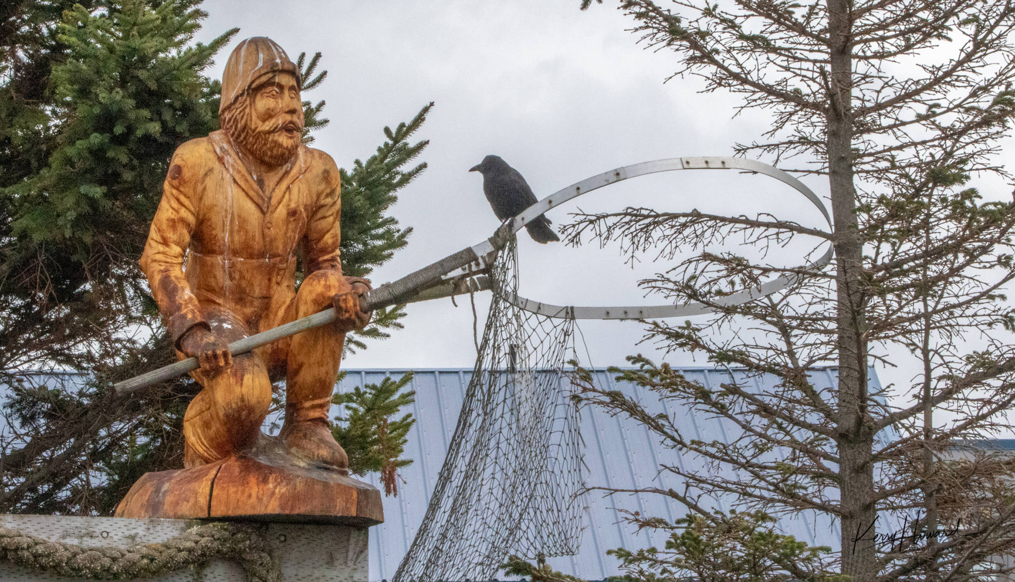 ”Hey, where’s my fish?” asked the crow on this fisherman’s sculpture. (Courtesy Photo | Kerry Howard)