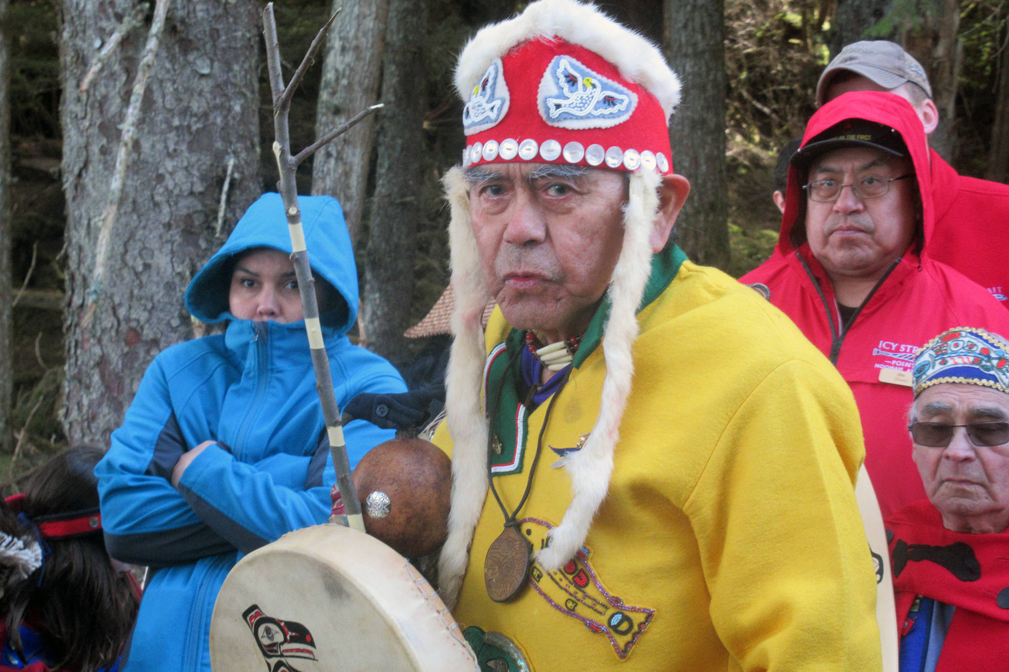 George “Digger” Dalton Jr. stands in regalia during a ground breaking and ground blessing ceremony for at the site of a new dock being built at Icy Strait Point near Hoonah, May 1, 2019. (Ben Hohenstatt | Juneau Empire)