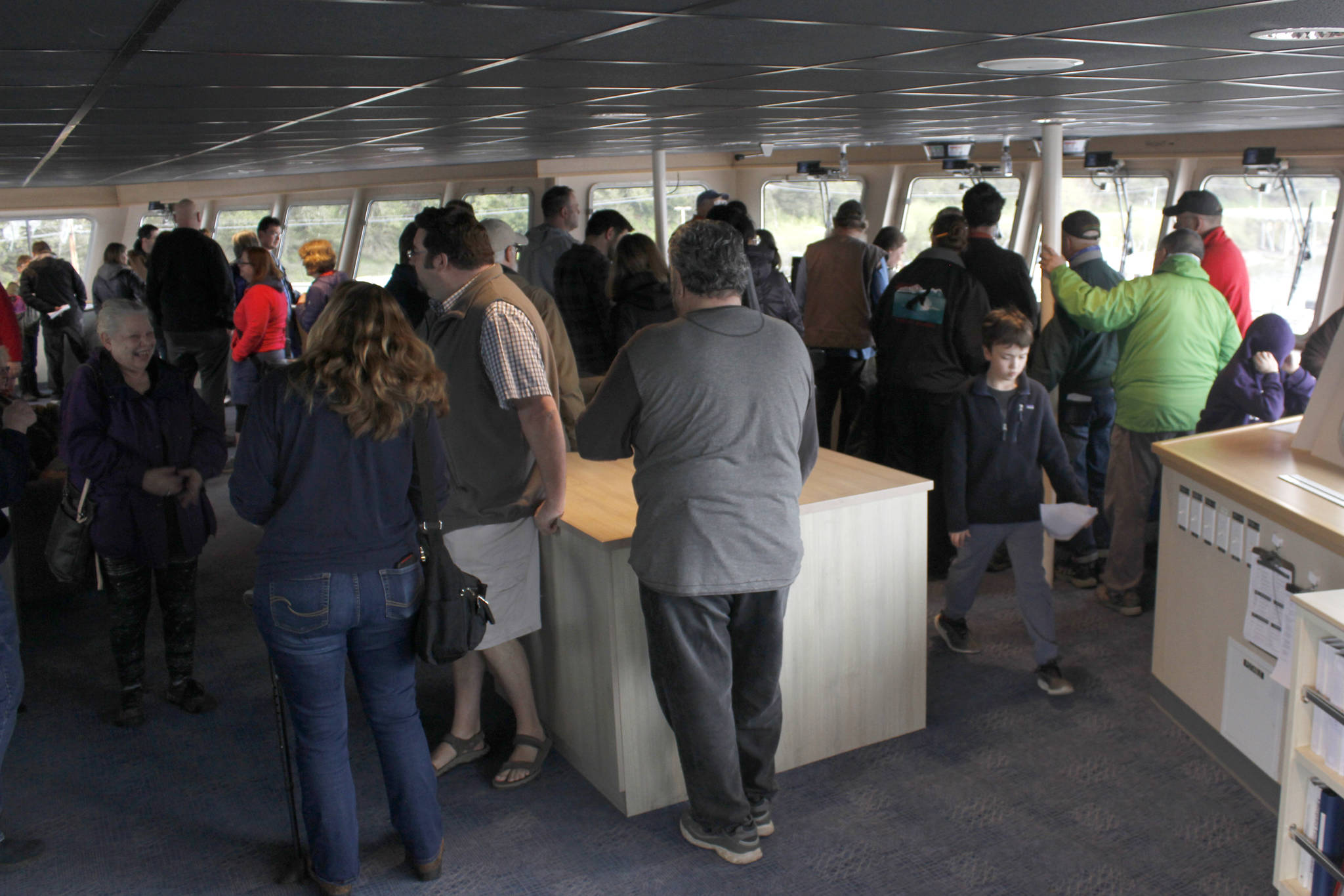Members of the public explore the bridge of the ferry Tazlina on Sunday, May 5, 2019. (Alex McCarthy | Juneau Empire)