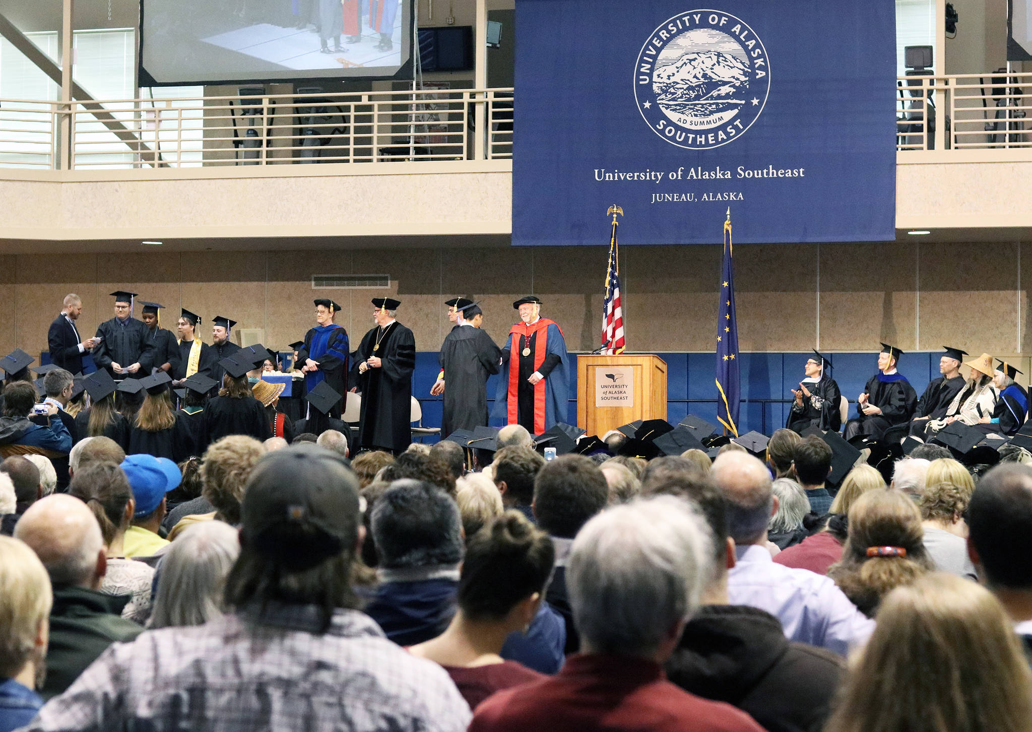 The University of Alaska Southeast Recreation Center was packed with graduates, faculty, family and friends during the commencement ceremony on Sunday, May 5, 2019. (Erin Laughlin | For the Juneau Empire)