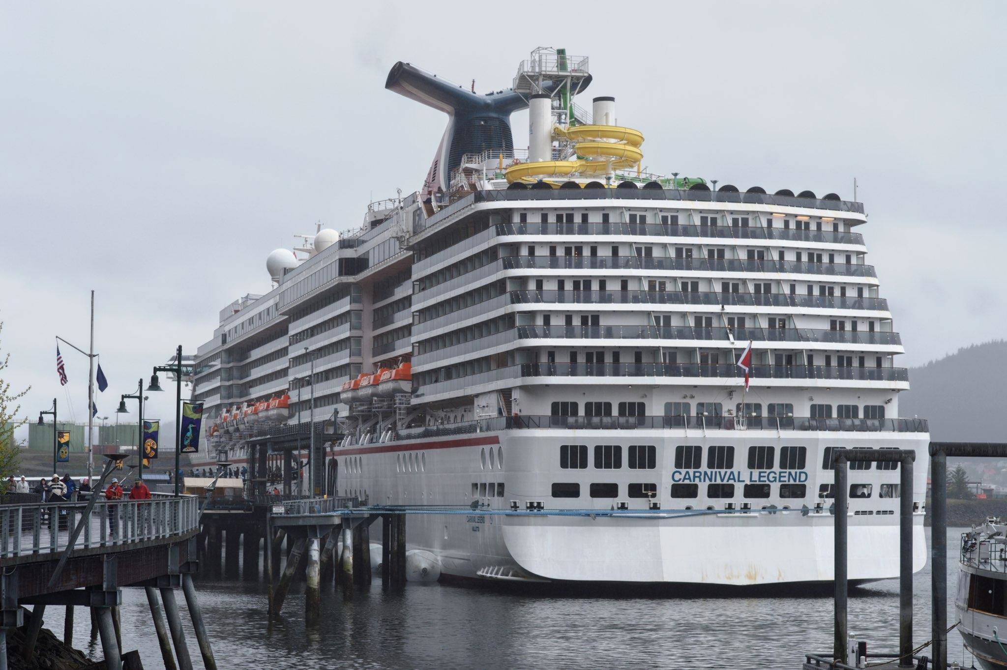 Passengers disembark from the cruise ship Carnival Legend at the South Franklin Dock on Wednesday, May 8, 2019. The company was cited for excess air pollution last year. (Michael Penn | Juneau Empire)                                Passengers disembark from the cruise ship Carnival Legend at the South Franklin Dock on Wednesday, May 8, 2019. The company was cited for excess air pollution last year. (Michael Penn | Juneau Empire)