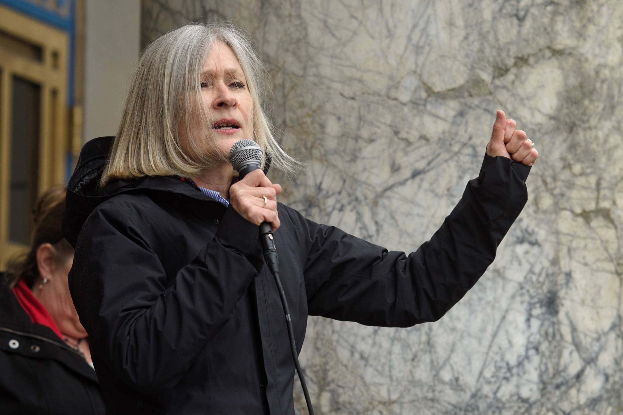 Rep. Andi Story, D-Juneau, speaks in favor of the Alaska Marine Highway System during an SOS rally at the Alaska State Capitol on Tuesday, May 7, 2019. (Michael Penn | Juneau Empire)