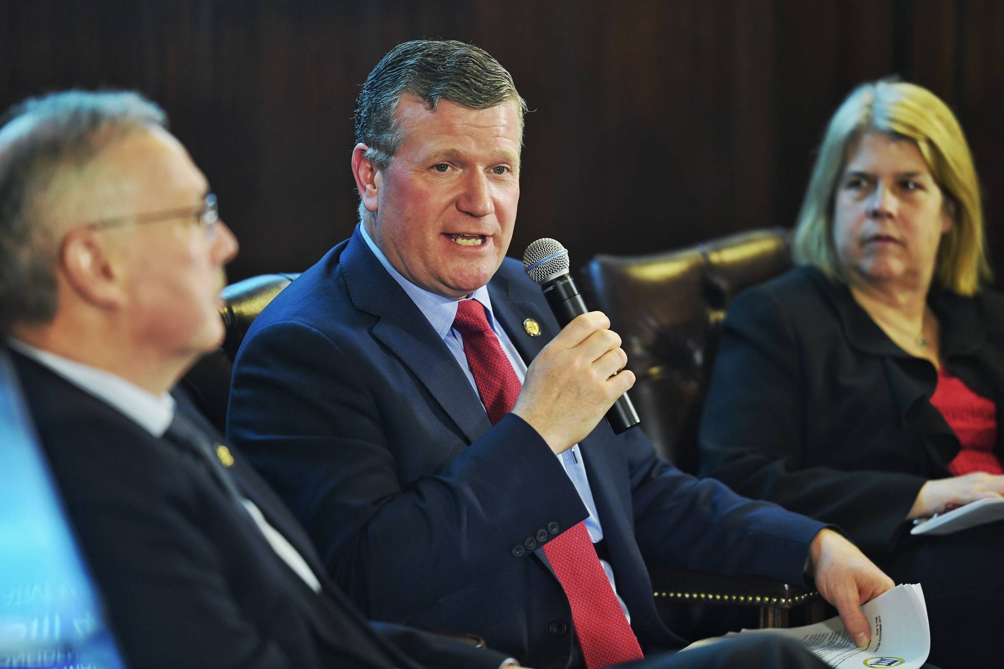 Rep. Chuck Kopp, R-Anchorage, center, speaks about the House passing a crime bill during a press conference with Speaker of the House Bryce Edgmon, D-Dillingham, left, and Rep. Tammie Wilson, R-North Pole, at the Capitol on Wednesday, May 8, 2019. (Michael Penn | Juneau Empire)