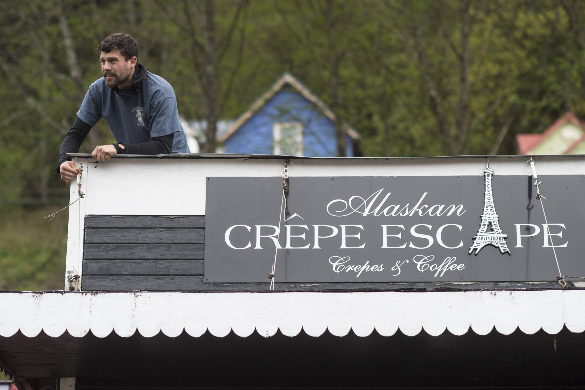 Dave McCasland, owner of Deckhand Dave’s Fish Tacos, sets up lights on food truck businesses being setup at Gunakedeit Park, also known as Pocket Park, on Thursday, May 9, 2019. The businesses are expected to be open by Monday. (Michael Penn | Juneau Empire)