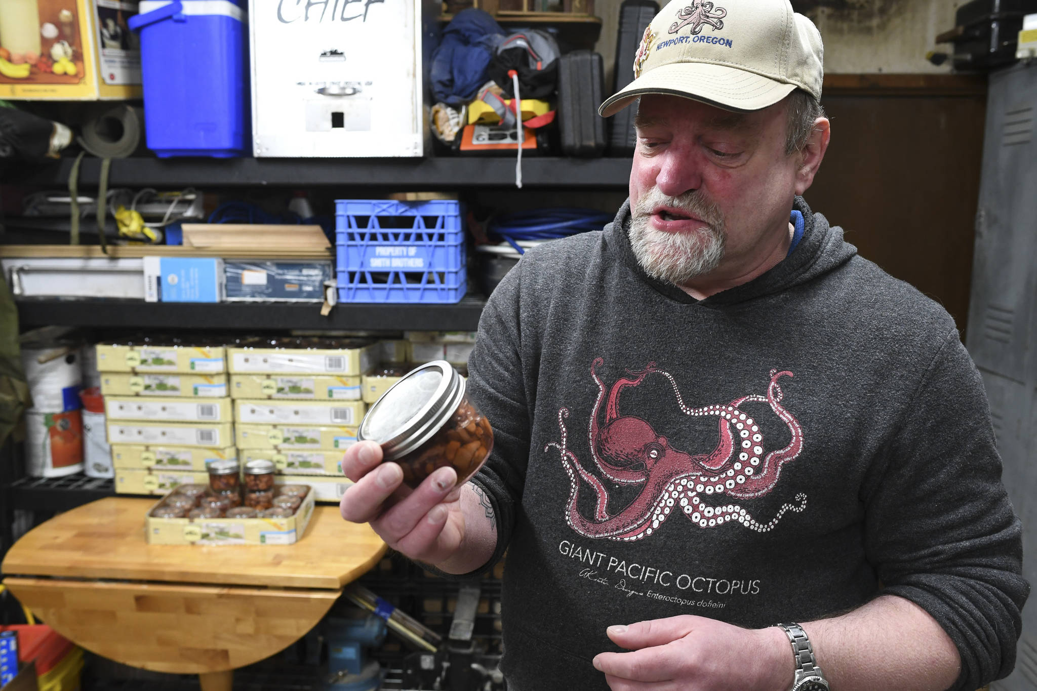 Rik Pruett talks about his work to bring smoked octopus to market at his Mendenhall Valley home on Friday, April 26, 2019. Pruitt said it has been a dream come true and something he has been working on for over 25 years. (Michael Penn | Juneau Empire)