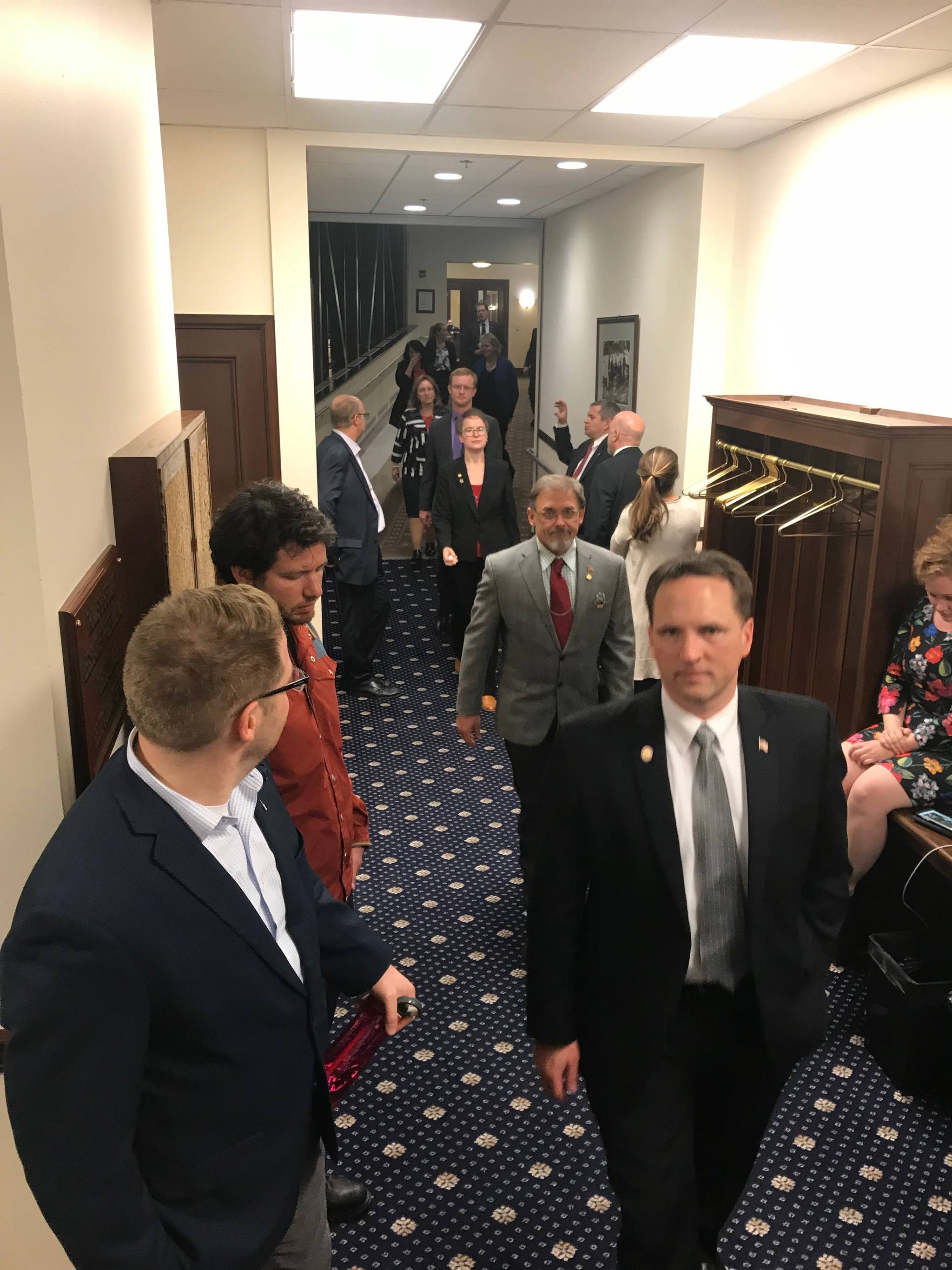 Members of the House Minority walk to the House floor. (Alex McCarthy | Juneau Empire)