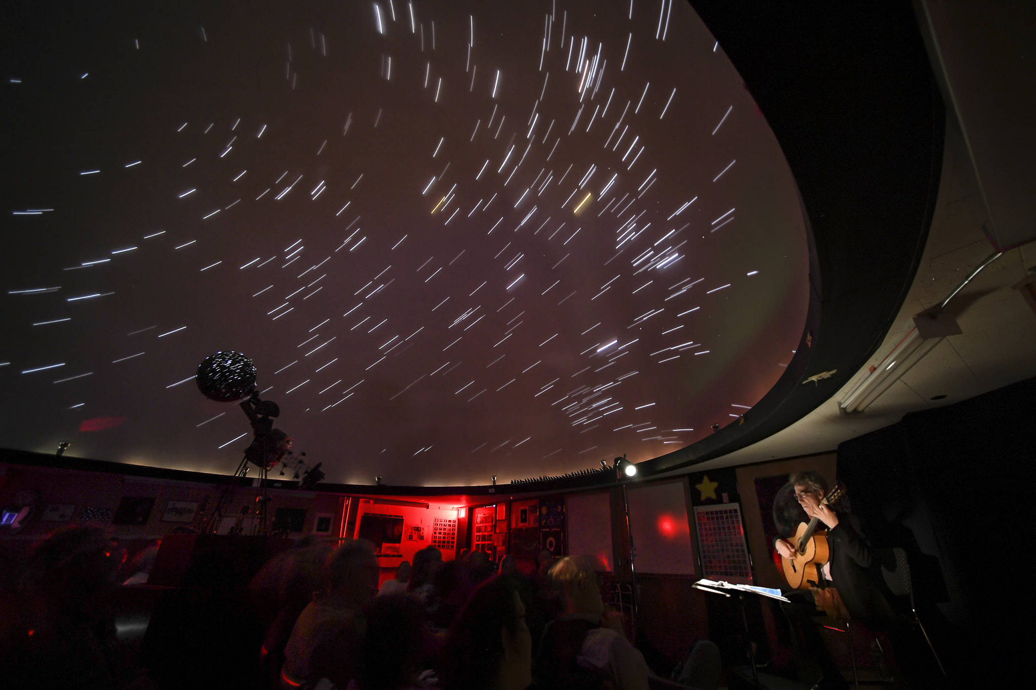 Classical guitarist Eliot Fisk plays “Bach Under the Stars” at the Marie Drake Planetarium as part of Juneau Jazz & Classics on Thursday, May 9, 2019. The music festival continues through May 18. (Michael Penn | Juneau Empire)