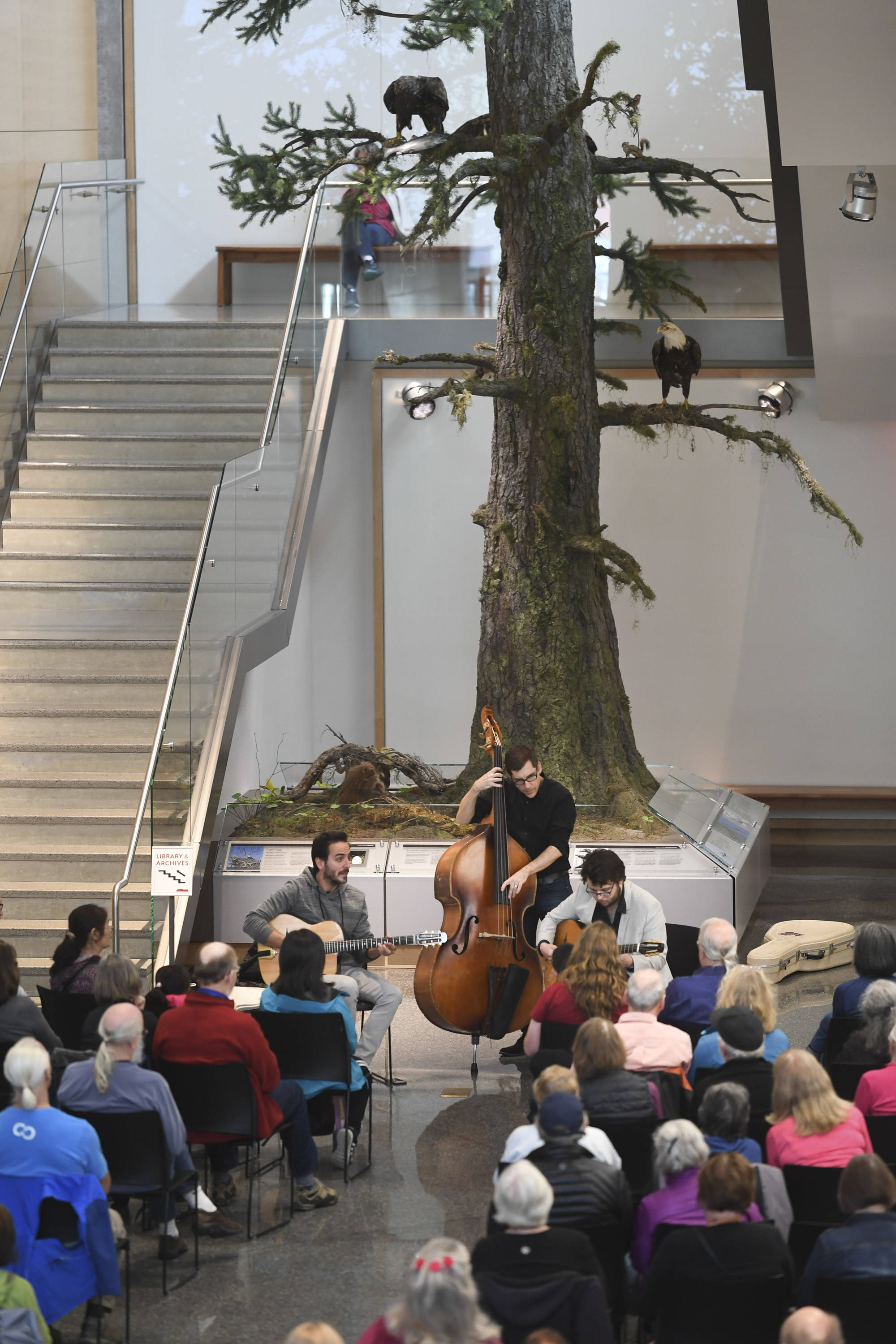 Members of the Gonzalo Bergara Trio perform in the atrium of the Andrew P. Kashevaroff (APK) Building as part of Juneau Jazz & Classics on Friday, May 10, 2019. The music festival continues through May 18. (Michael Penn | Juneau Empire)