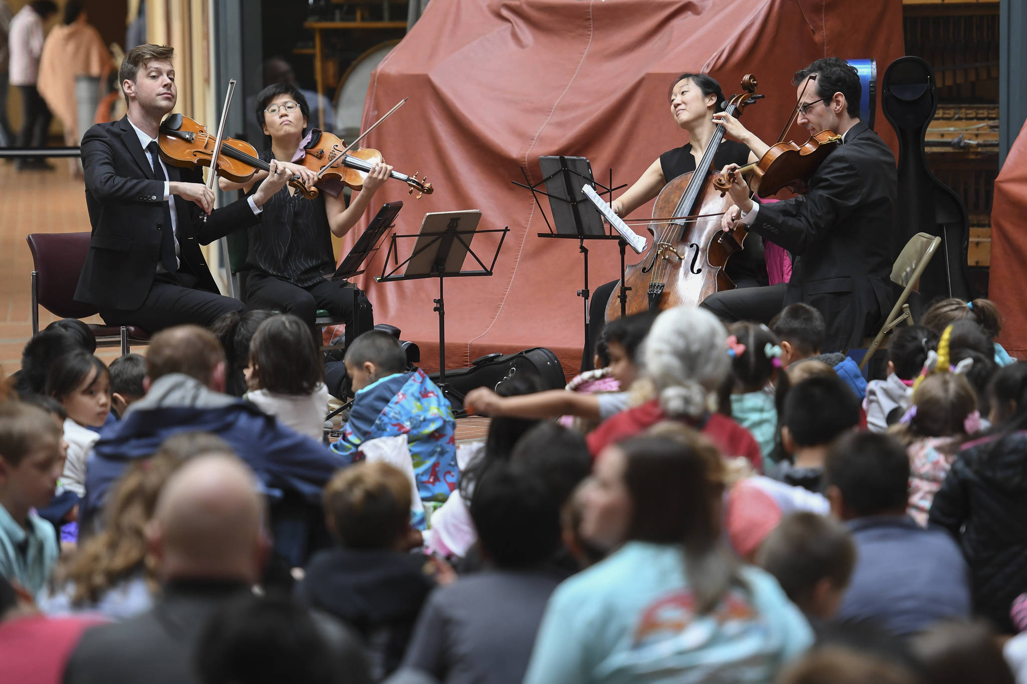 Members of the Argus String Quartet play a Brown Bag Concert at the State Office Building on Wednesday, May 15, 2019. (Michael Penn | Juneau Empire)