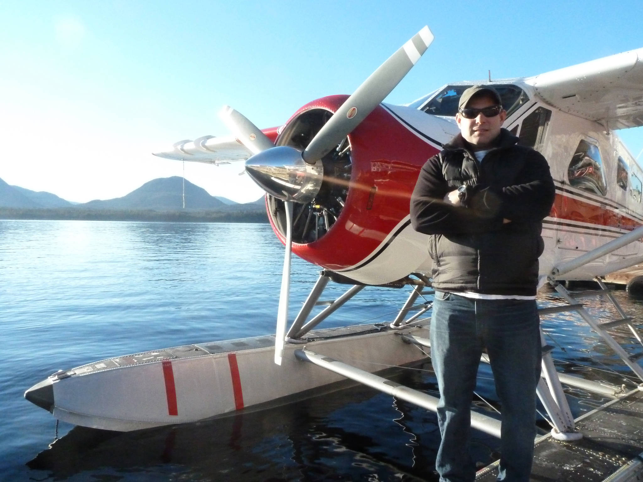 In this 2014 photo, Randy Sullivan poses for a photo in Ketchikan, Alaska. Sullivan was the pilot of one of the two sightseeing planes that crashed in midair Monday, May 13, 2019, the National Transportation Safety Board announced after a team arrived from Washington, D.C., to investigate the crash. Alaska State Troopers in a statement late Tuesday said Sullivan was killed in the crash. (James Glionna/Los Angeles Times via AP)