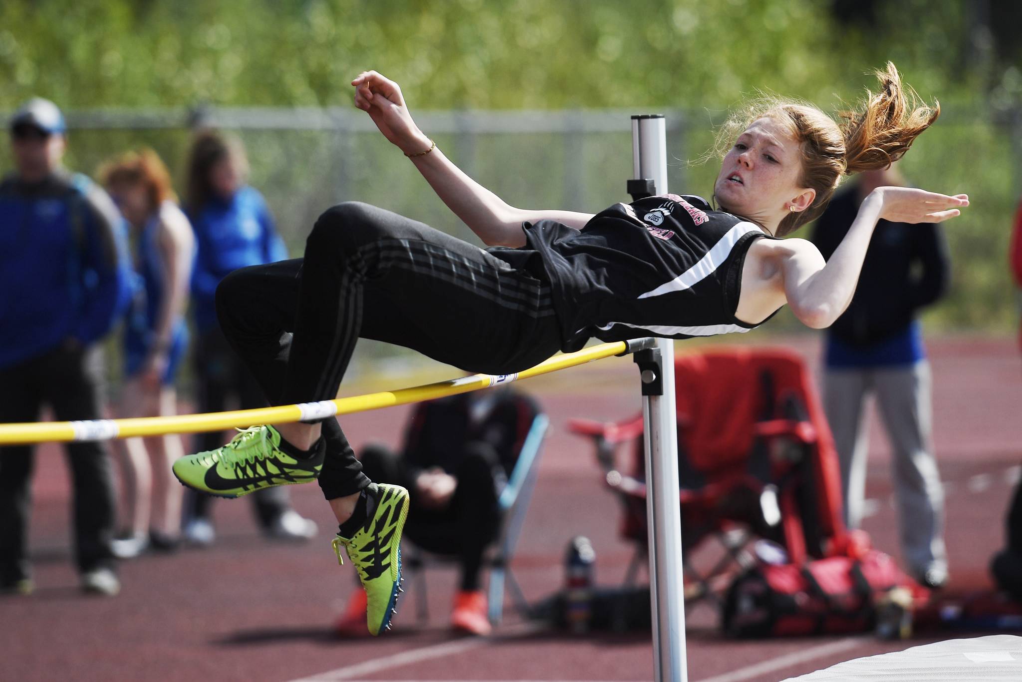 Juneau-Douglas Ayah Frayley competes in the high jump at the Region V Track and Field Championships at Thunder Mountain High School on Friday, May 17, 2019. (Michael Penn | Juneau Empire)