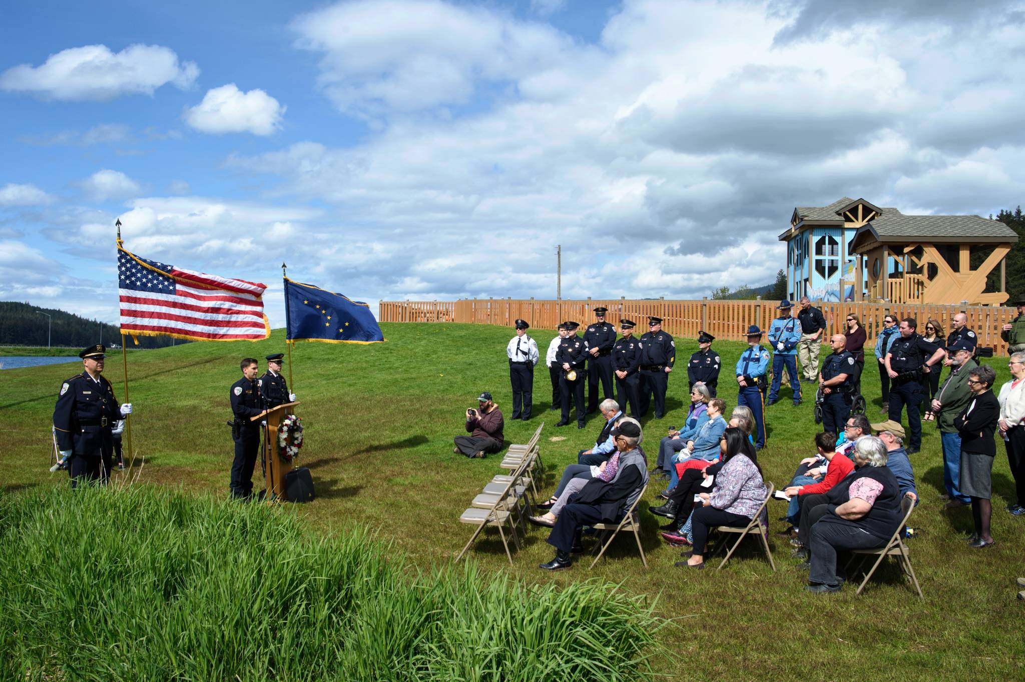 Juneau Police Departments Lt. Jeremy Weske speaks during a police memorial ceremony at Twin Lakes on Saturday, May 18, 2019. (Michael Penn | Juneau Empire)