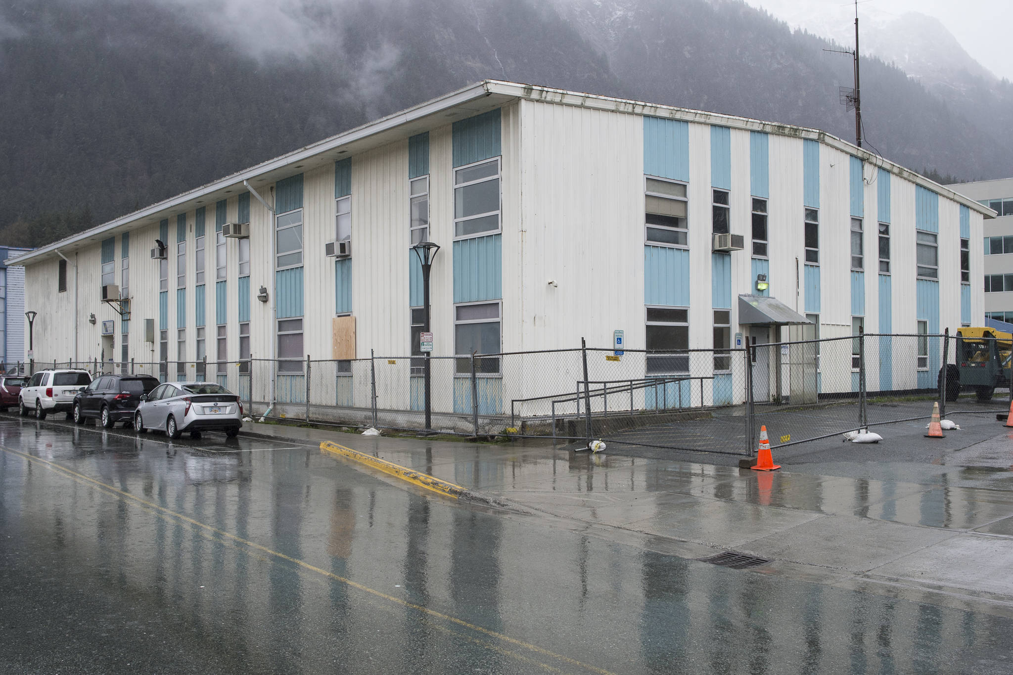 The former Public Safety Building has been fenced off for demolition on Thursday, April 18, 2019. (Michael Penn | Juneau Empire)