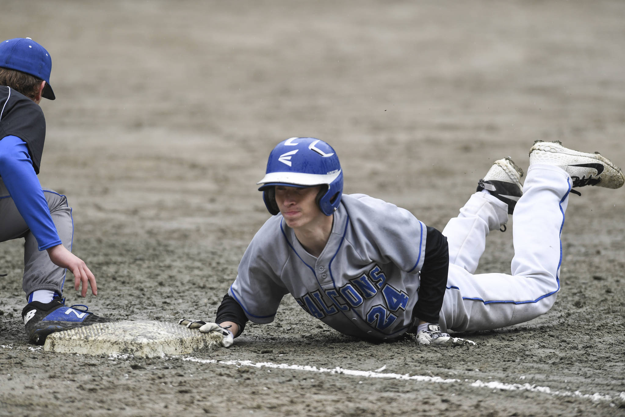 Thunder Mountain’s Josh Carte to forced to dive back to first base against Petersburg during the Region V Baseball Championship at Adair-Kennedy Memorial Park on Thursday, May 23, 2019. Petersburg won 4-1. (Michael Penn | Juneau Empire)