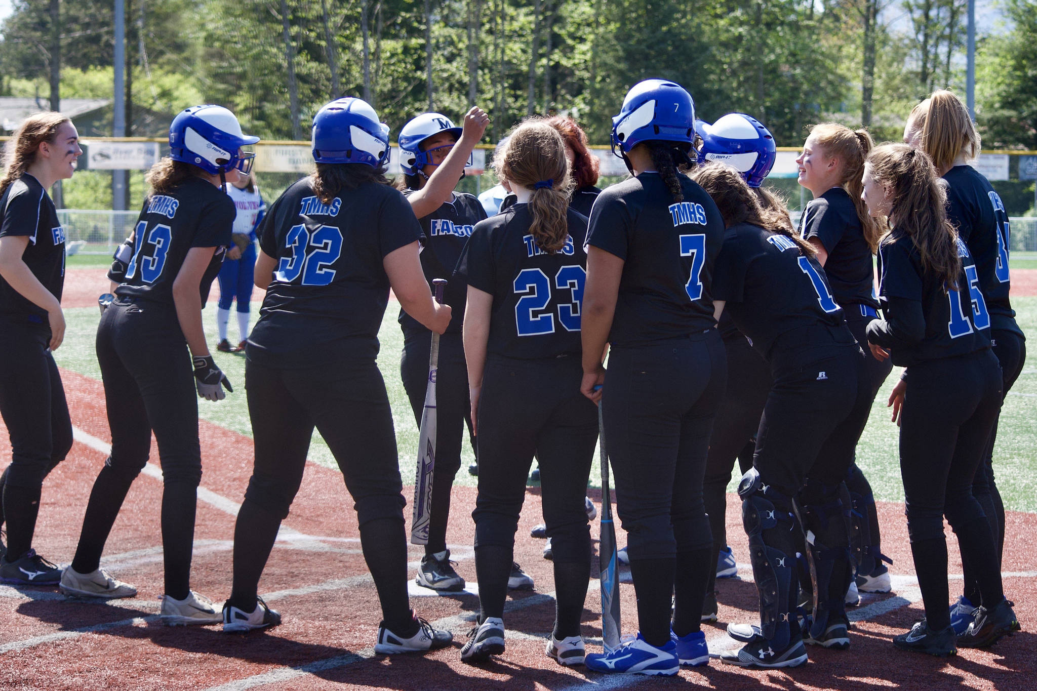Thunder Mountain High softball players congratulate Mariah Tanuvasa Tuvaifale after she hit a home run against Sitka at the Region V tournament on Saturday, May 25, 2019. (Courtesy photo | Sharla Hayes)