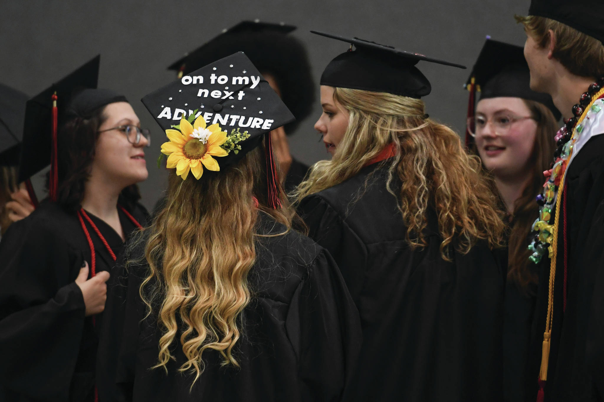 Students line up for the Juneau-Douglas High School: Yadaa.at Kalé graduation ceremony on Sunday.
