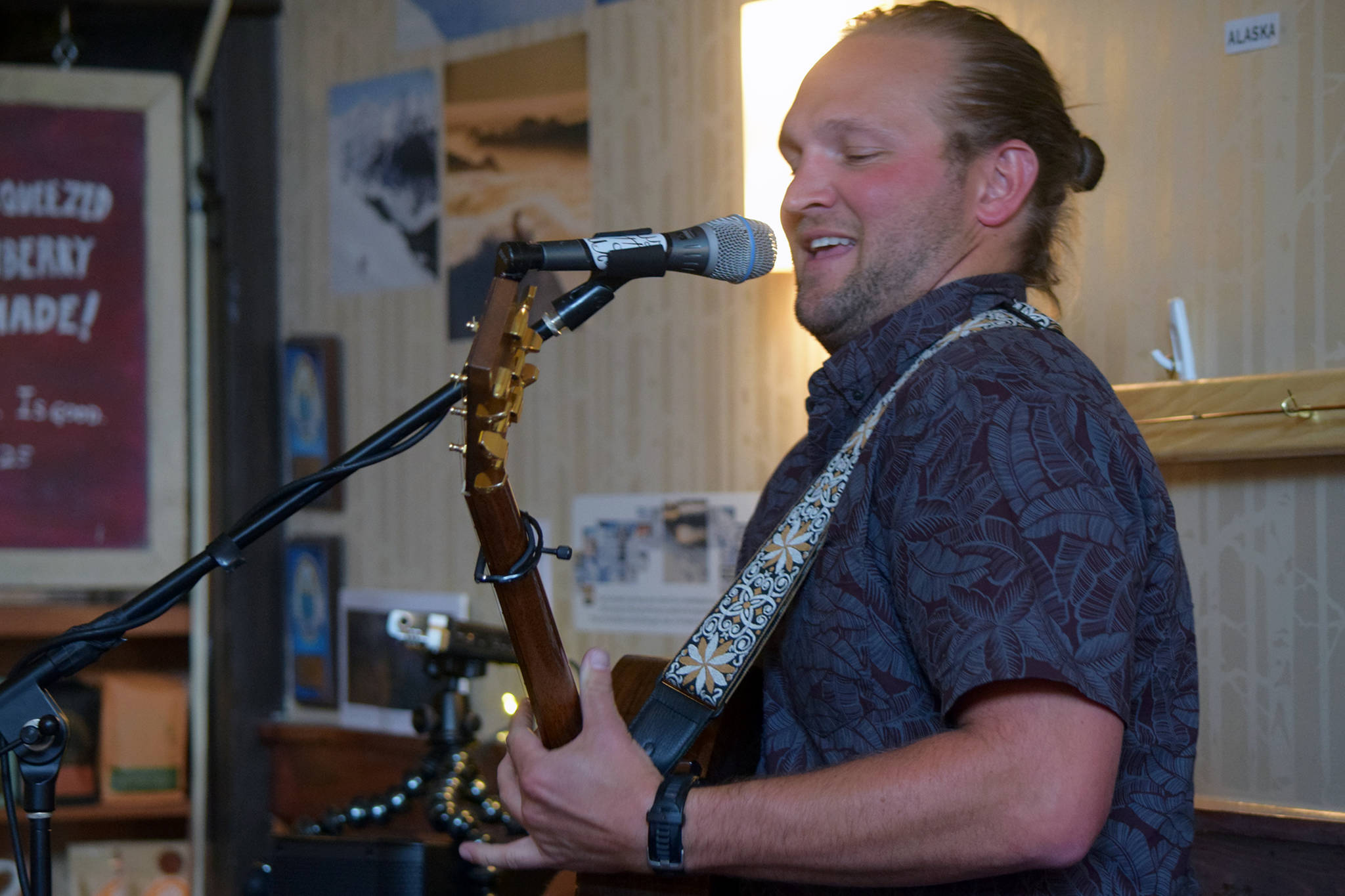 Curtiss O’Rorke Stedman, who performs as Cousin Curtiss, plays guitar at the Rookery Cafe, Wednesday, May 29, 2019. (Ben Hohenstatt | Capital City Weekly)