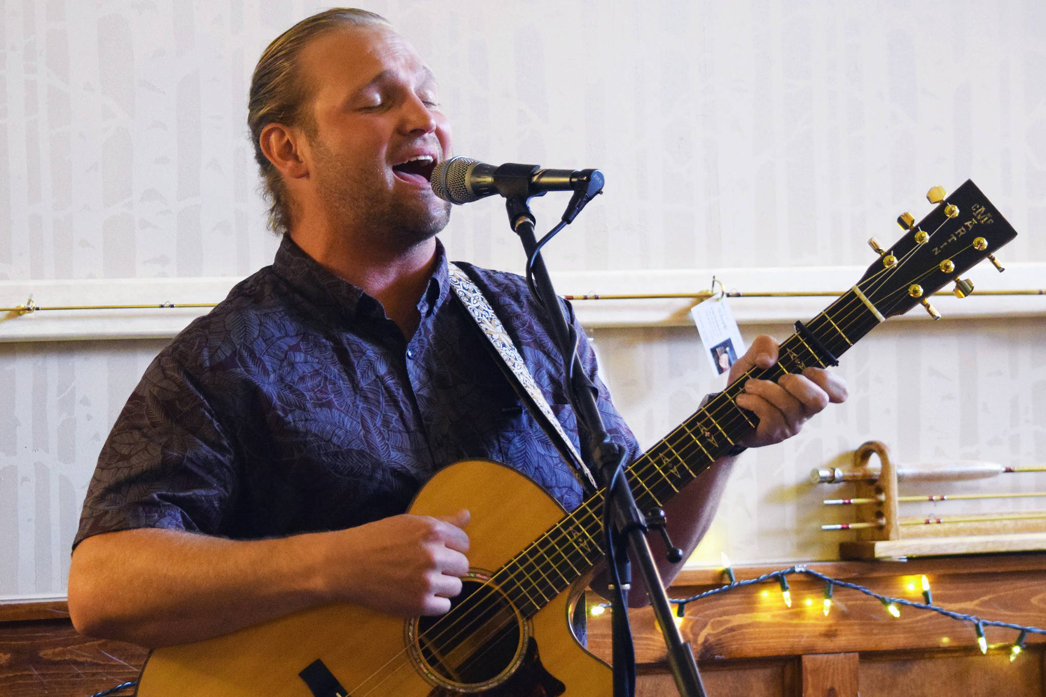 Curtiss O’Rorke Stedman, who performs as Cousin Curtiss, plays guitar at the Rookery Cafe, Wednesday, May 29, 2019. (Ben Hohenstatt | Capital City Weekly)