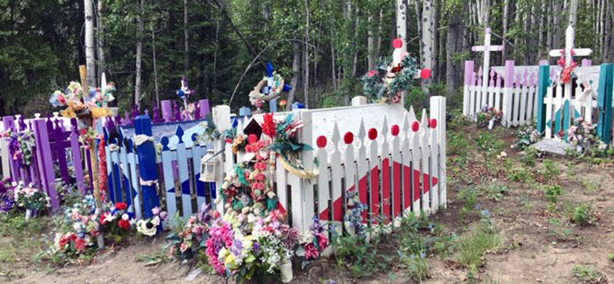 Bright colors decorate graves of fallen veterans of Northway, Alaska, along the Alaska Highway on May 30, 2019. (Courtesy Photo | Denise Carroll)